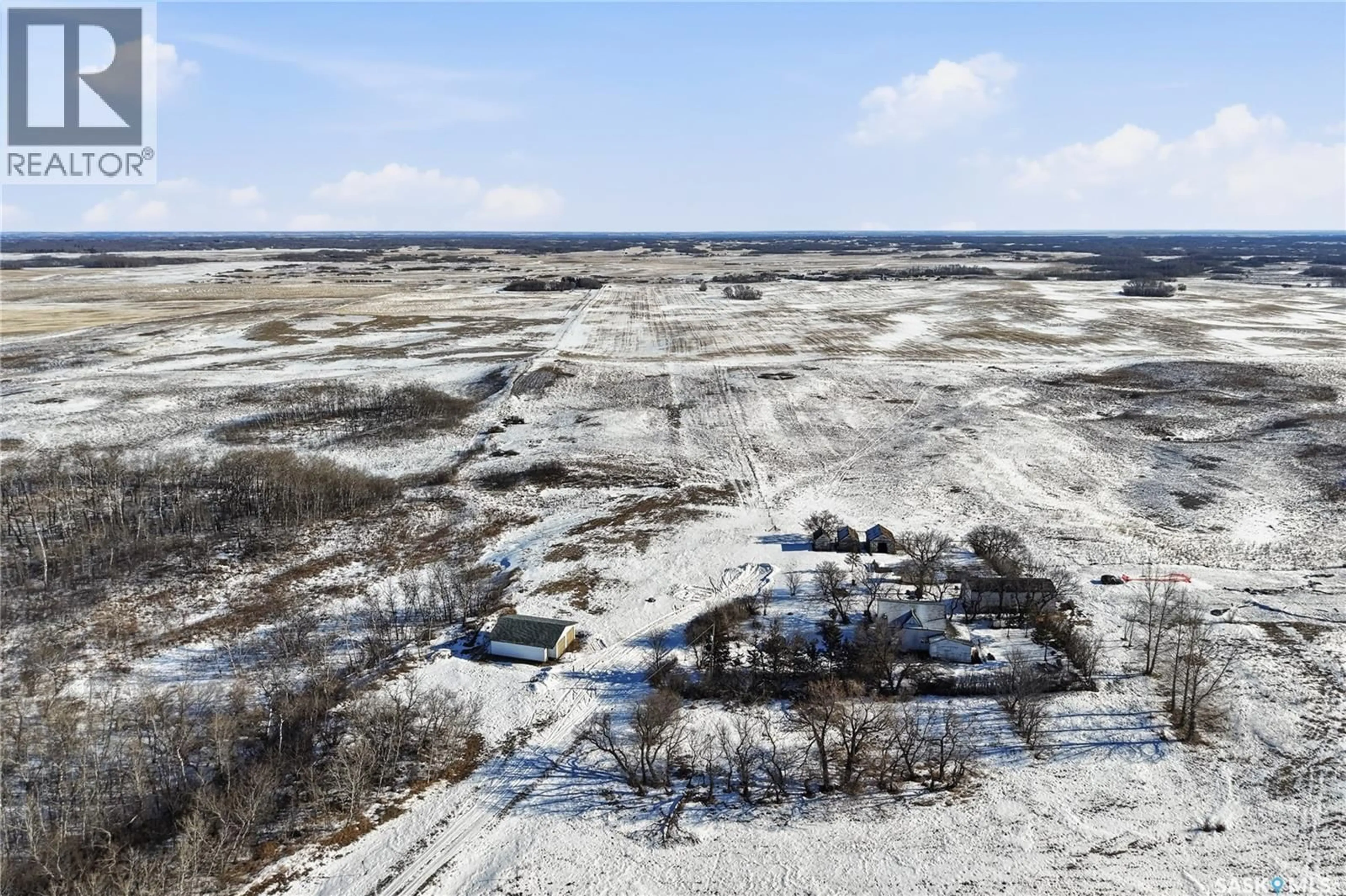 A pic from outside/outdoor area/front of a property/back of a property/a pic from drone, building for DISIEWICH ACREAGE, Vanscoy Rm No. 345 Saskatchewan S0L3J0
