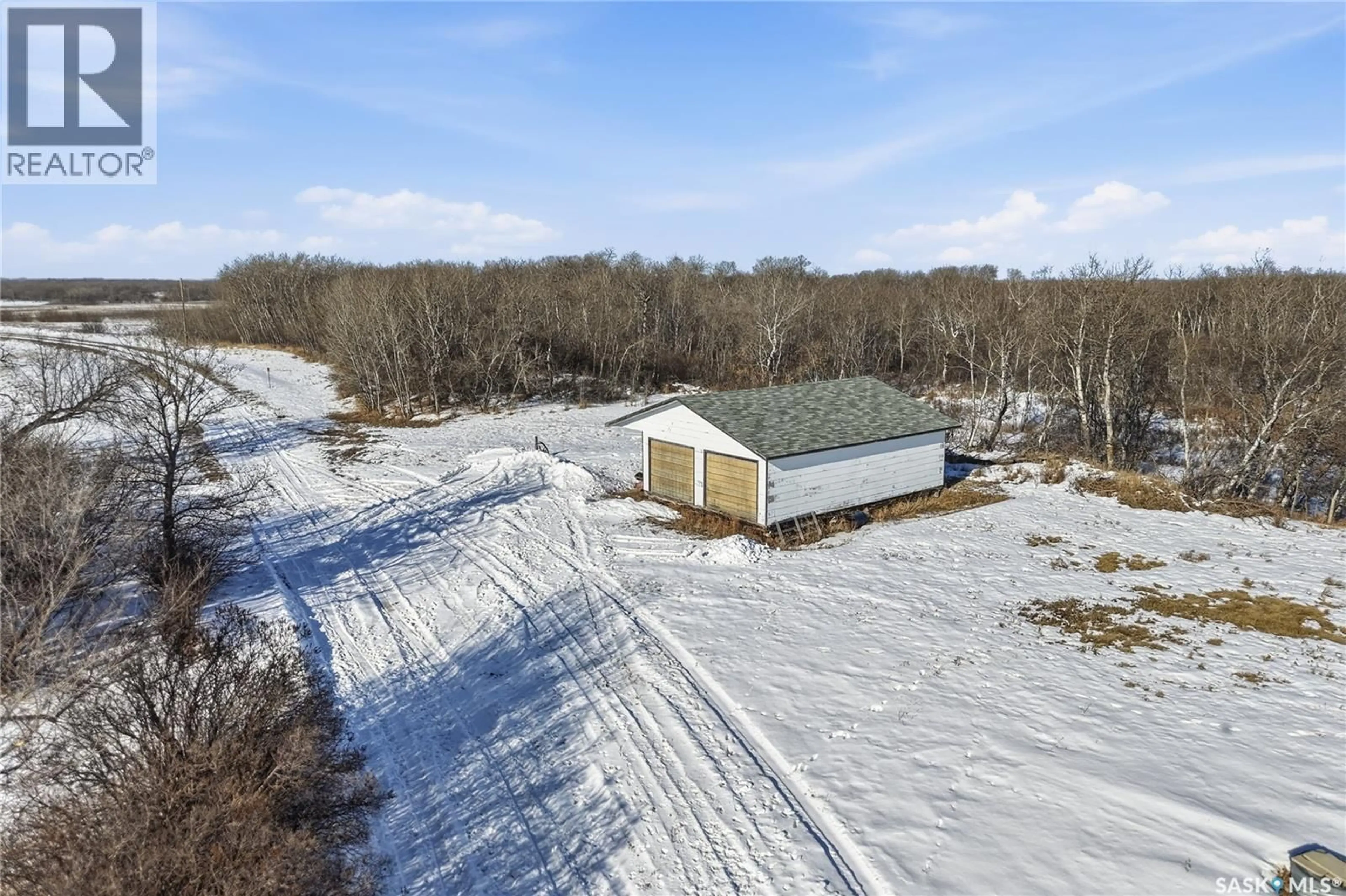 A pic from outside/outdoor area/front of a property/back of a property/a pic from drone, building for DISIEWICH ACREAGE, Vanscoy Rm No. 345 Saskatchewan S0L3J0