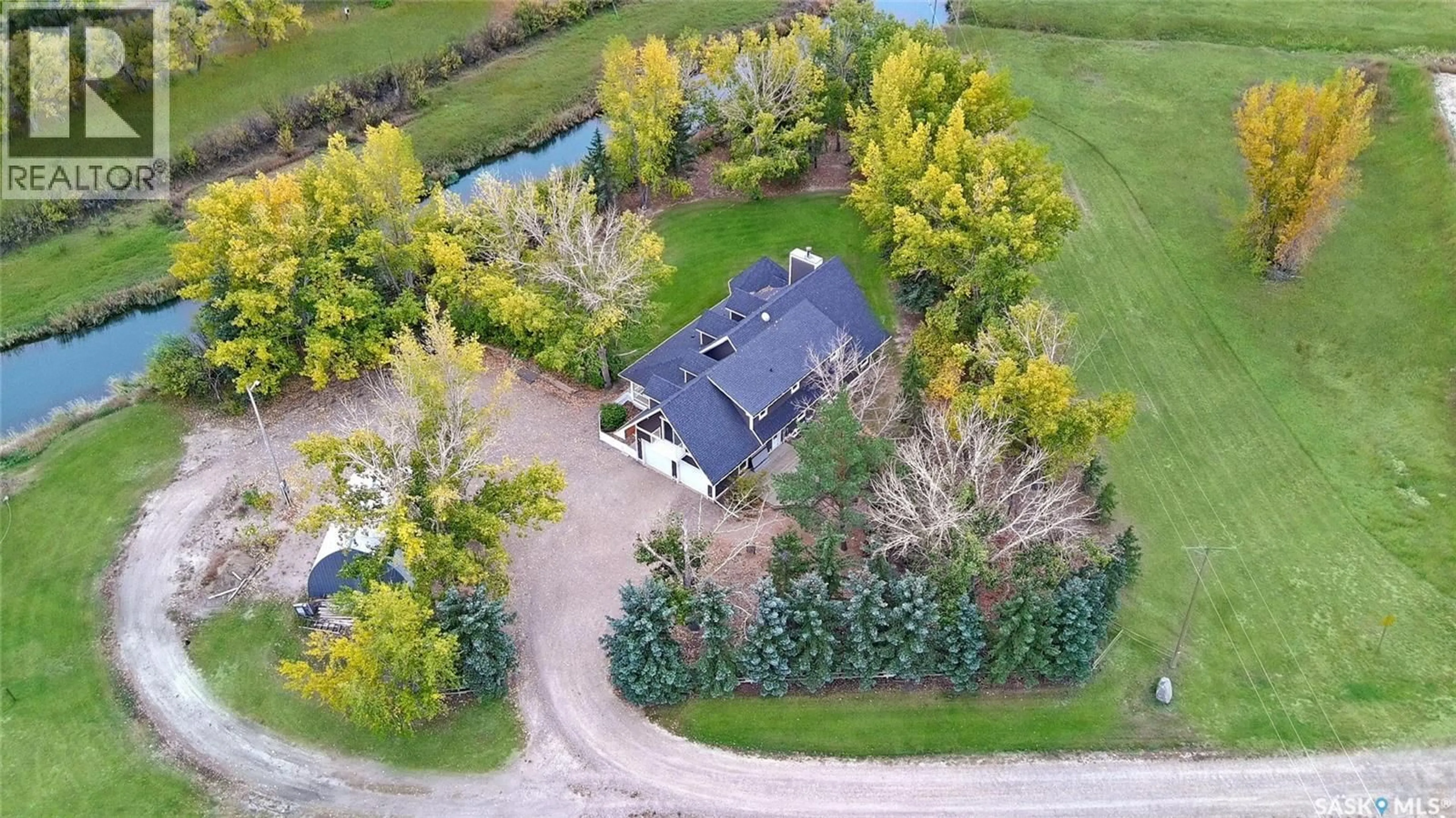 A pic from outside/outdoor area/front of a property/back of a property/a pic from drone, unknown for ACREAGE, Swift Current Saskatchewan S9H5N1
