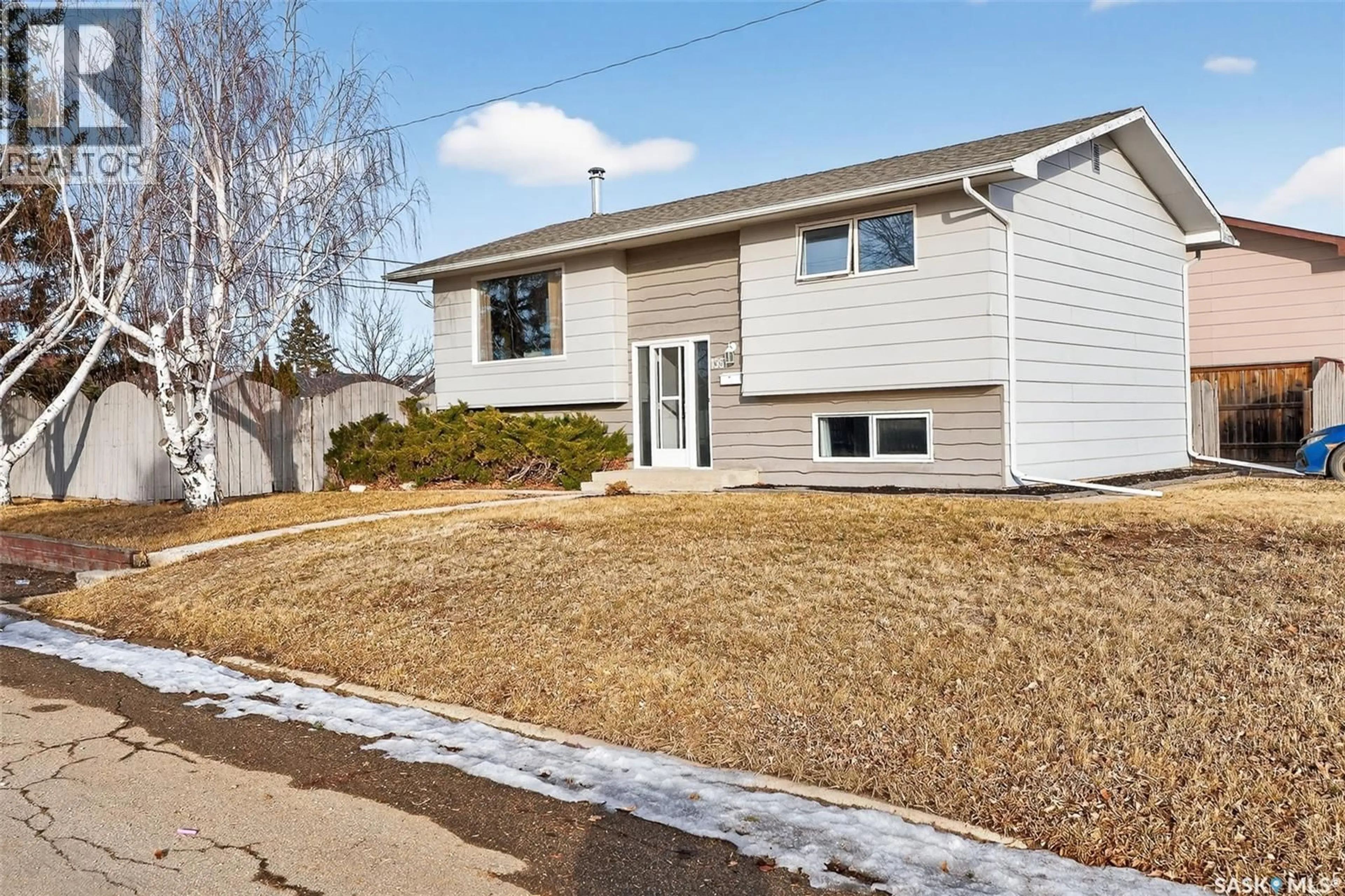 Home with vinyl exterior material, street for 1351 14TH AVENUE, Moose Jaw Saskatchewan S6H0S9