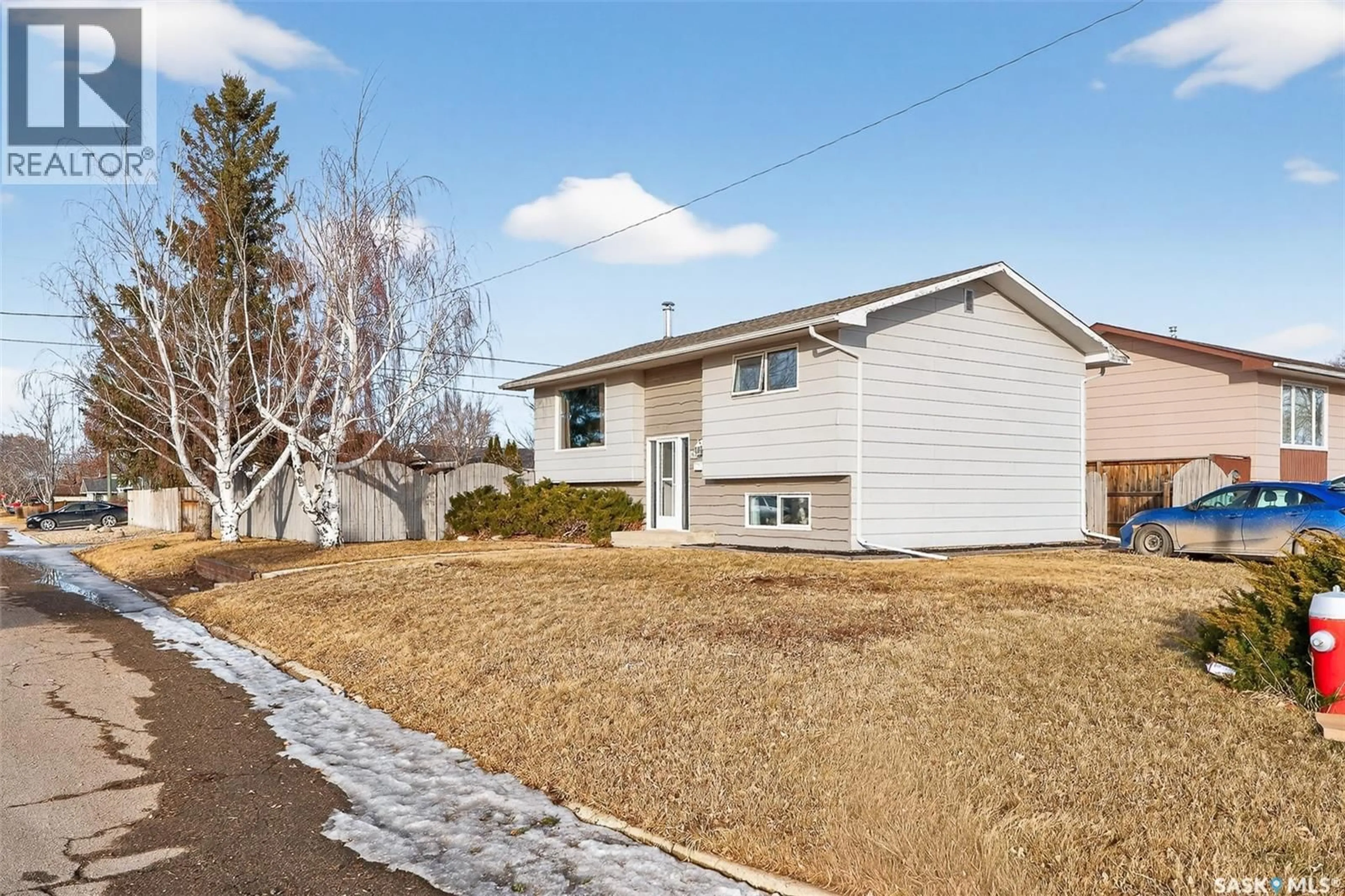 Home with vinyl exterior material, street for 1351 14TH AVENUE, Moose Jaw Saskatchewan S6H0S9