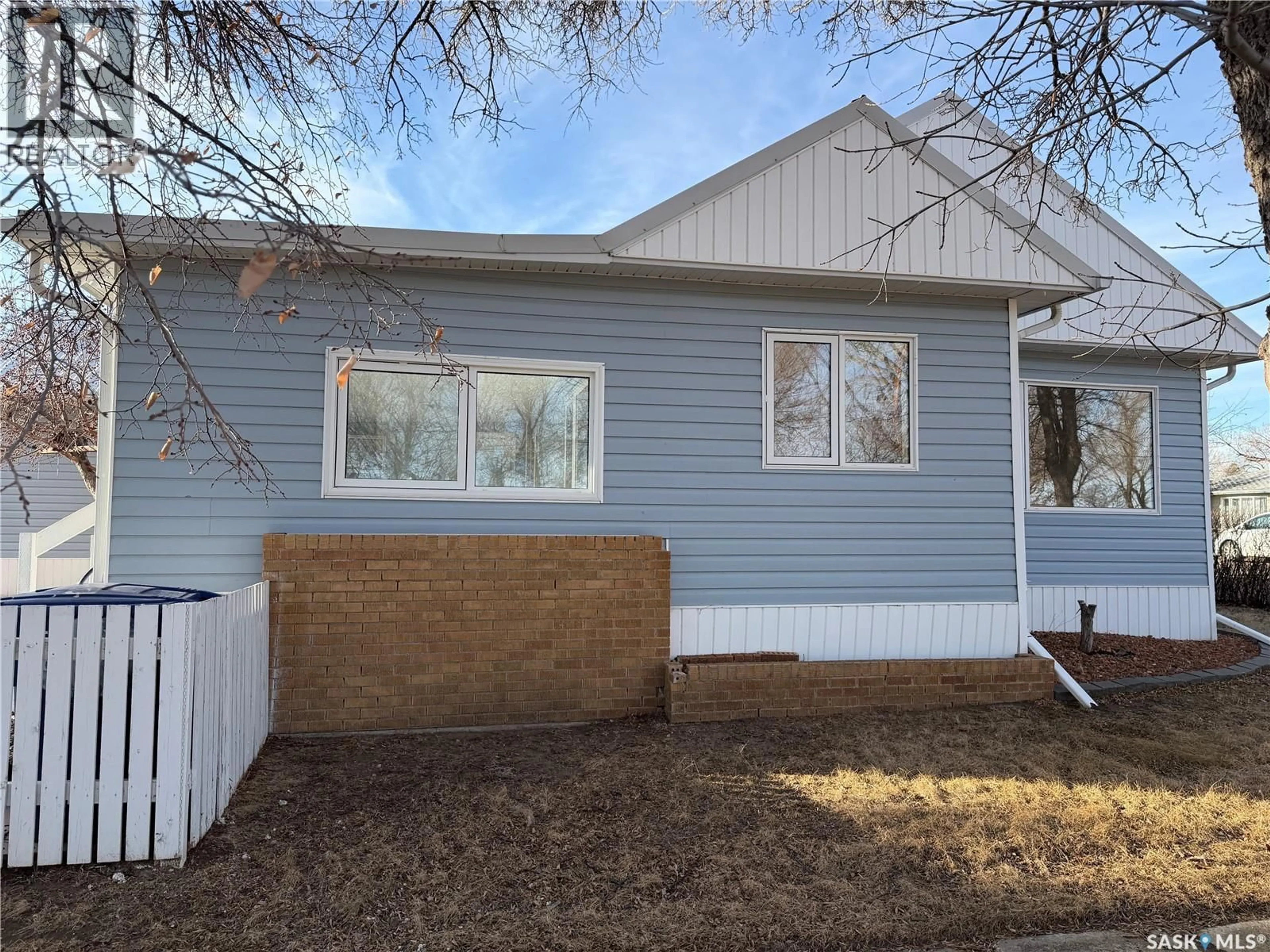 Home with vinyl exterior material, street for 133 RAILWAY AVENUE, Ponteix Saskatchewan S0N1Z0