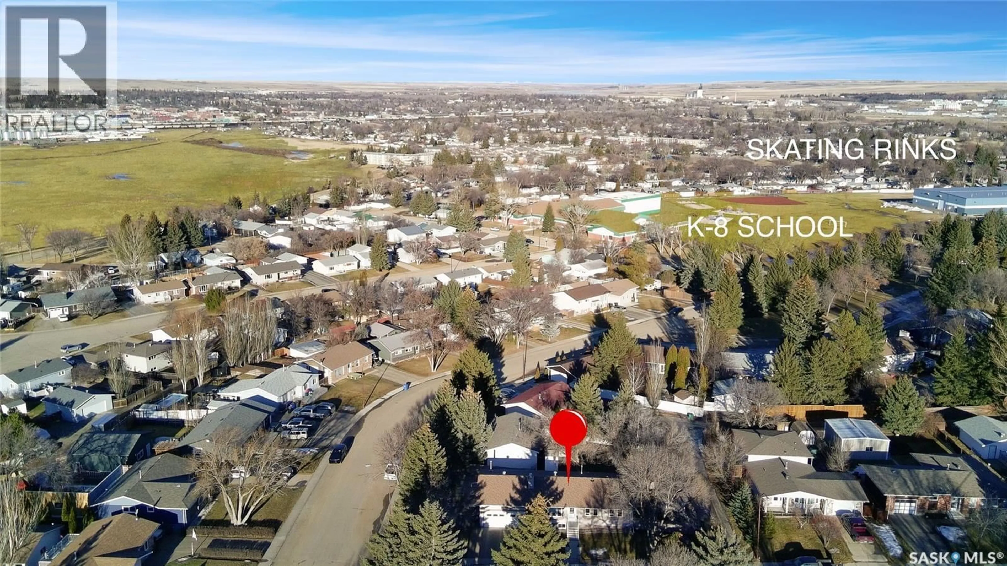 A pic from outside/outdoor area/front of a property/back of a property/a pic from drone, street for 372 HAYES DRIVE, Swift Current Saskatchewan S9H4H1