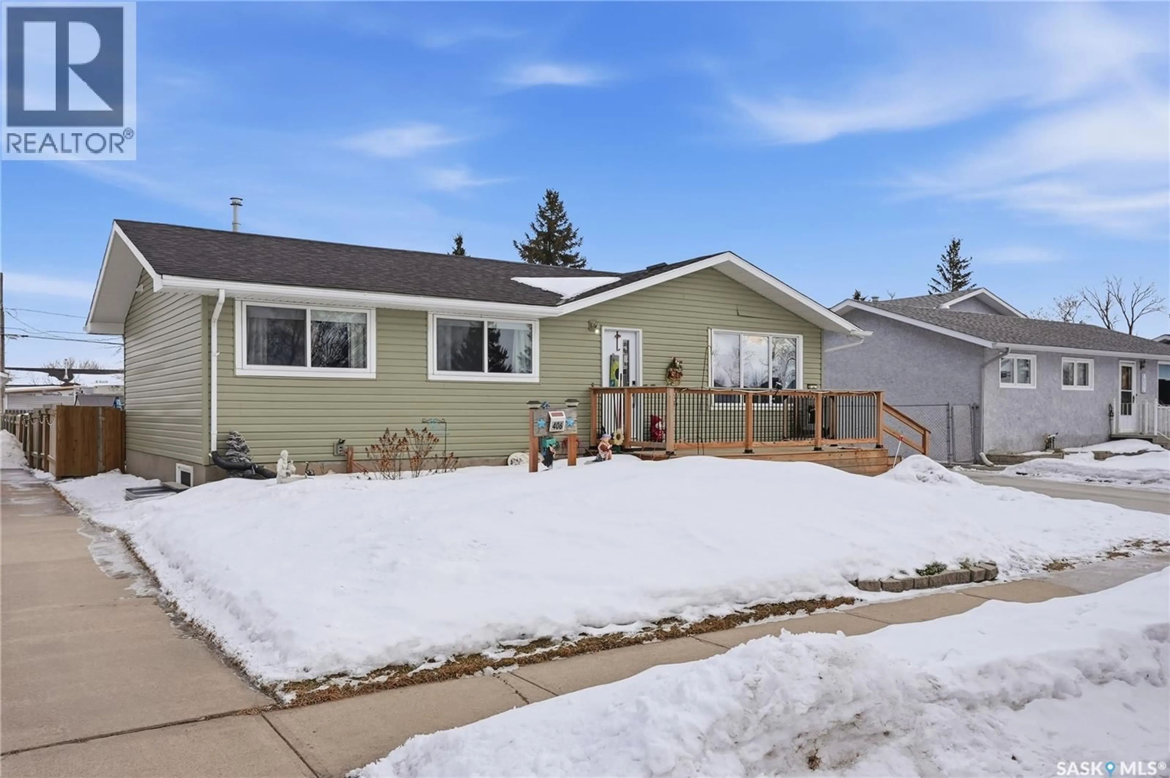 Home with vinyl exterior material, street for 406 7TH AVENUE, Warman Saskatchewan S0K4S0