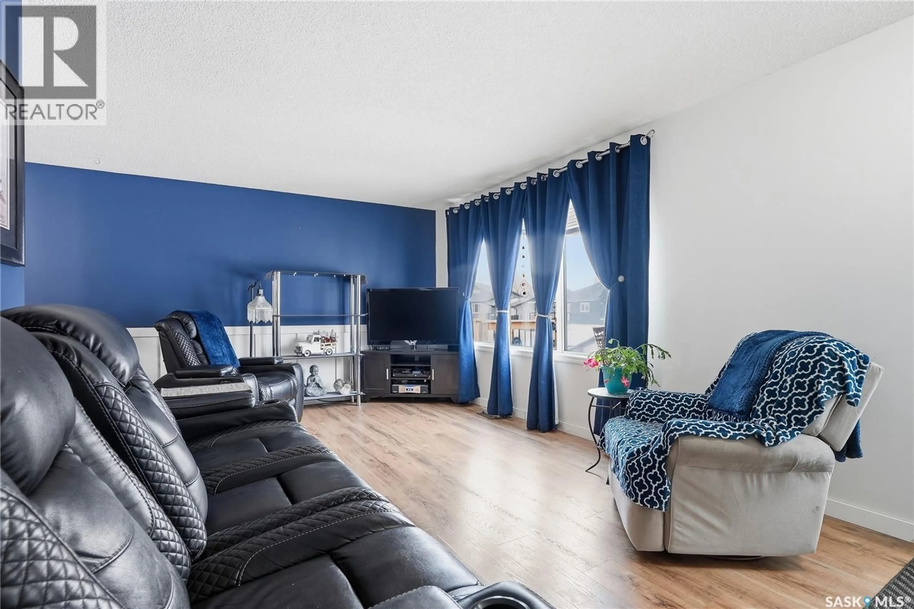 Living room with furniture, unknown for 406 7TH AVENUE, Warman Saskatchewan S0K4S0