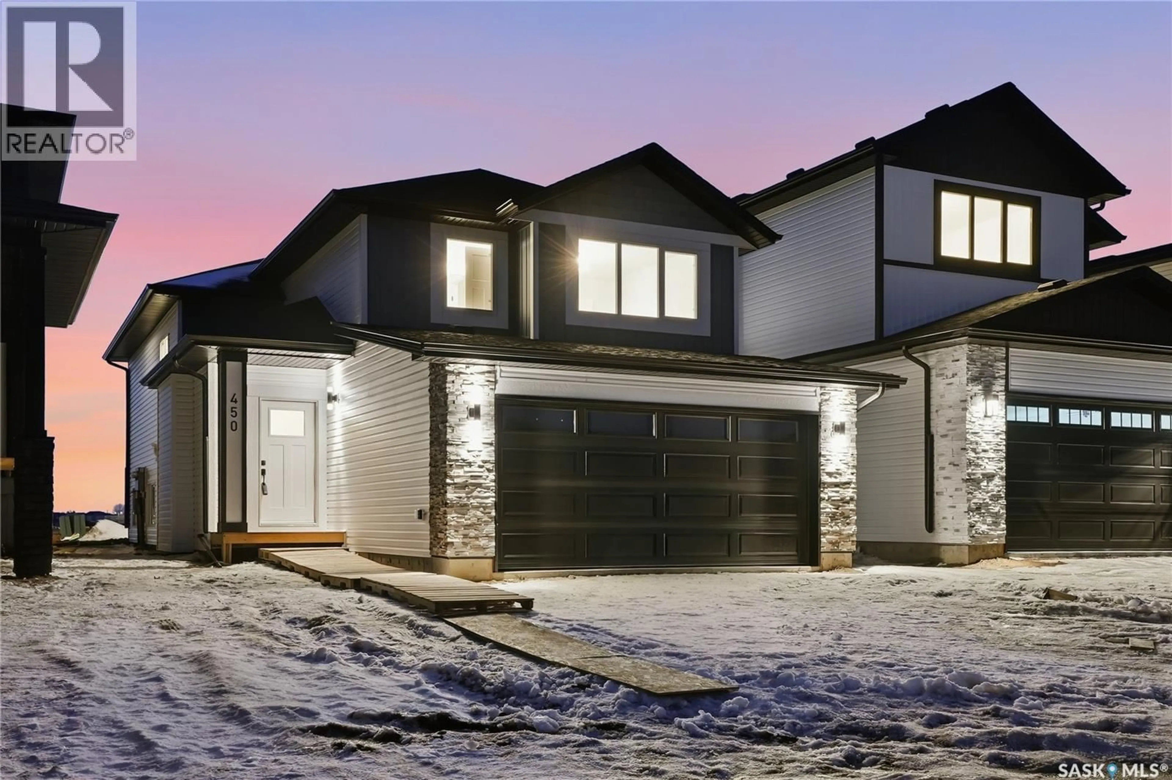 Home with brick exterior material, street for 450 NAZARALI MANOR, Saskatoon Saskatchewan S7V1X4