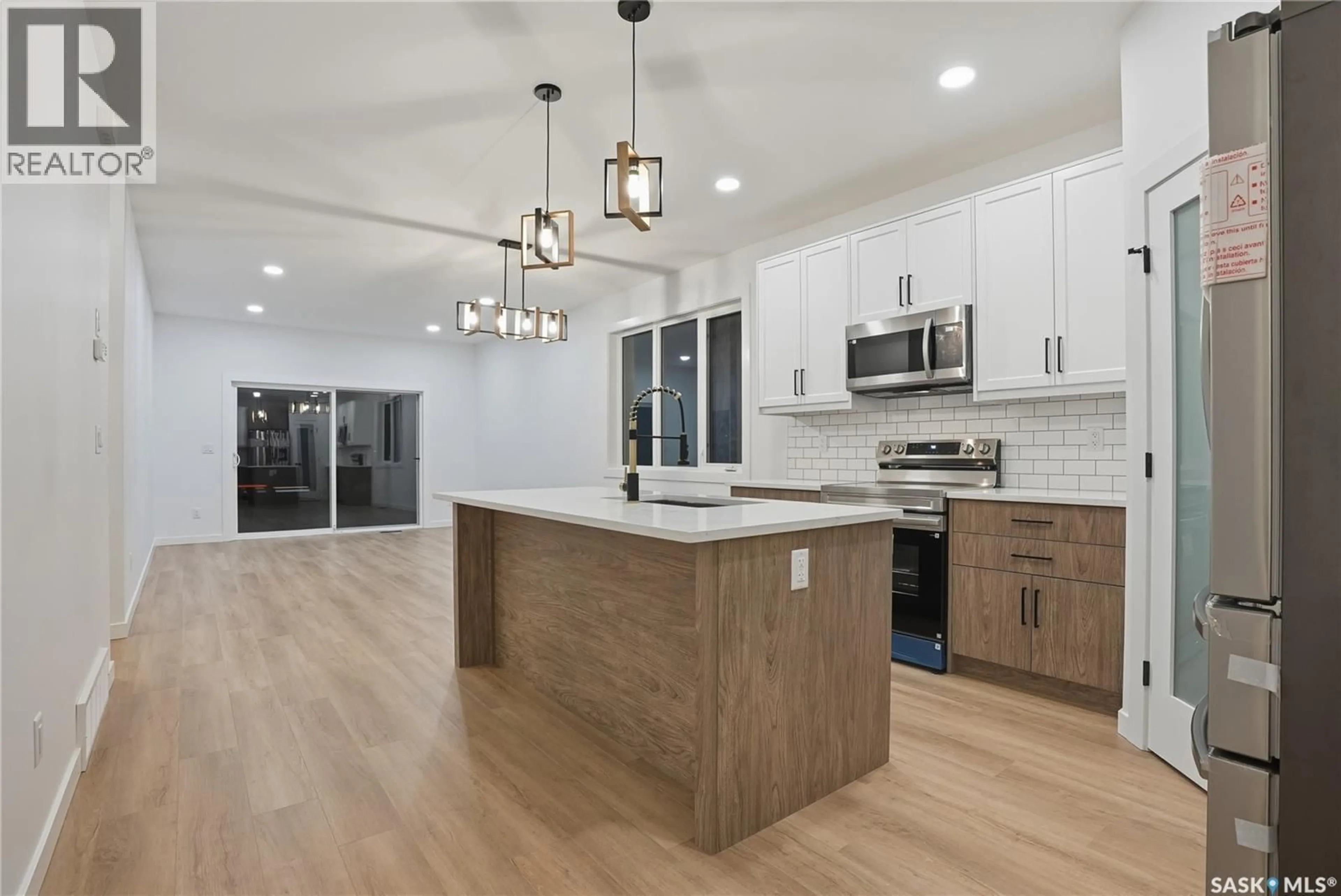 Open concept kitchen, unknown for 450 NAZARALI MANOR, Saskatoon Saskatchewan S7V1X4