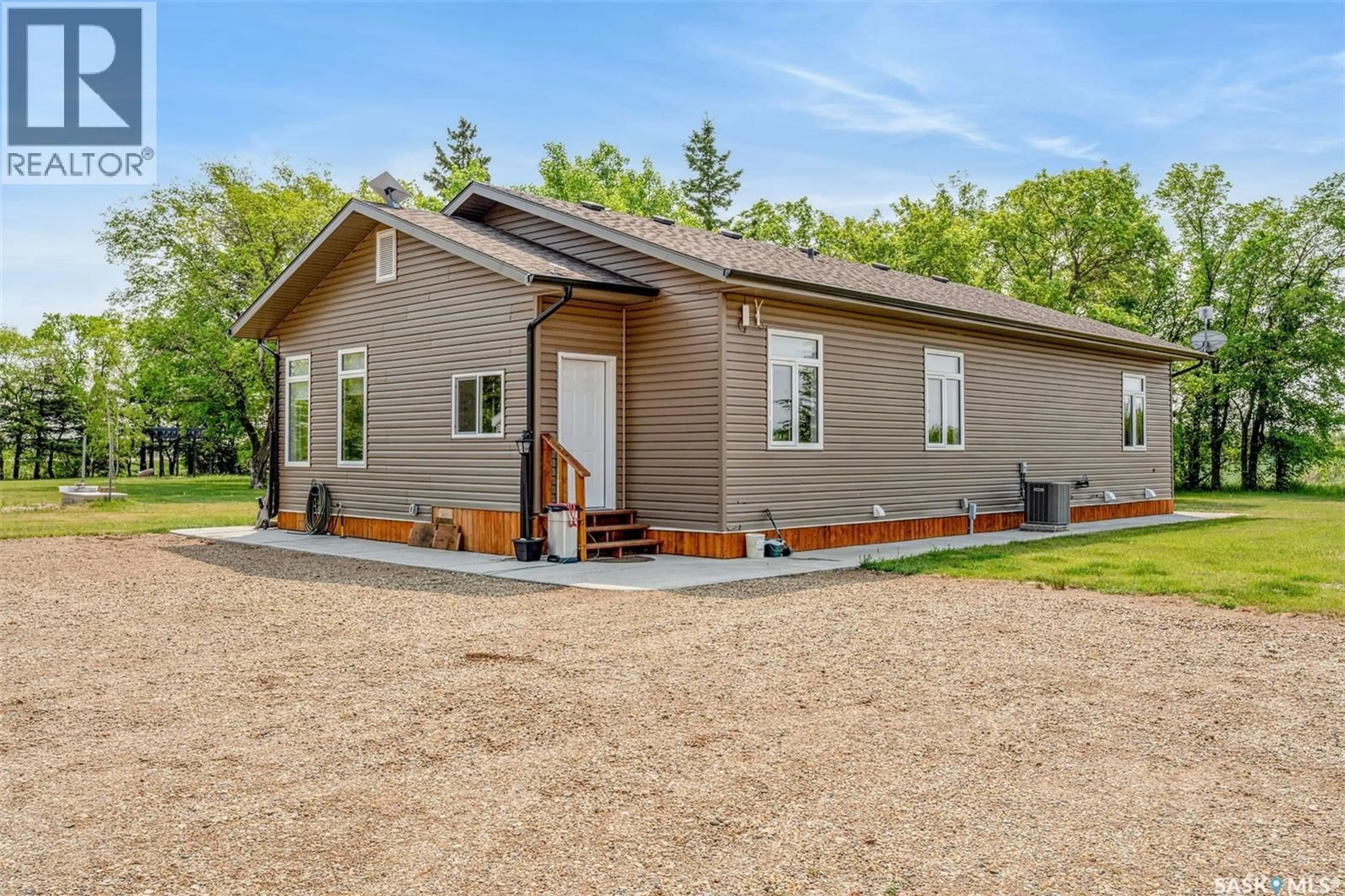 Home with vinyl exterior material, building for NAICAM ACREAGE, Spalding Rm No. 368 Saskatchewan S0K2Z0
