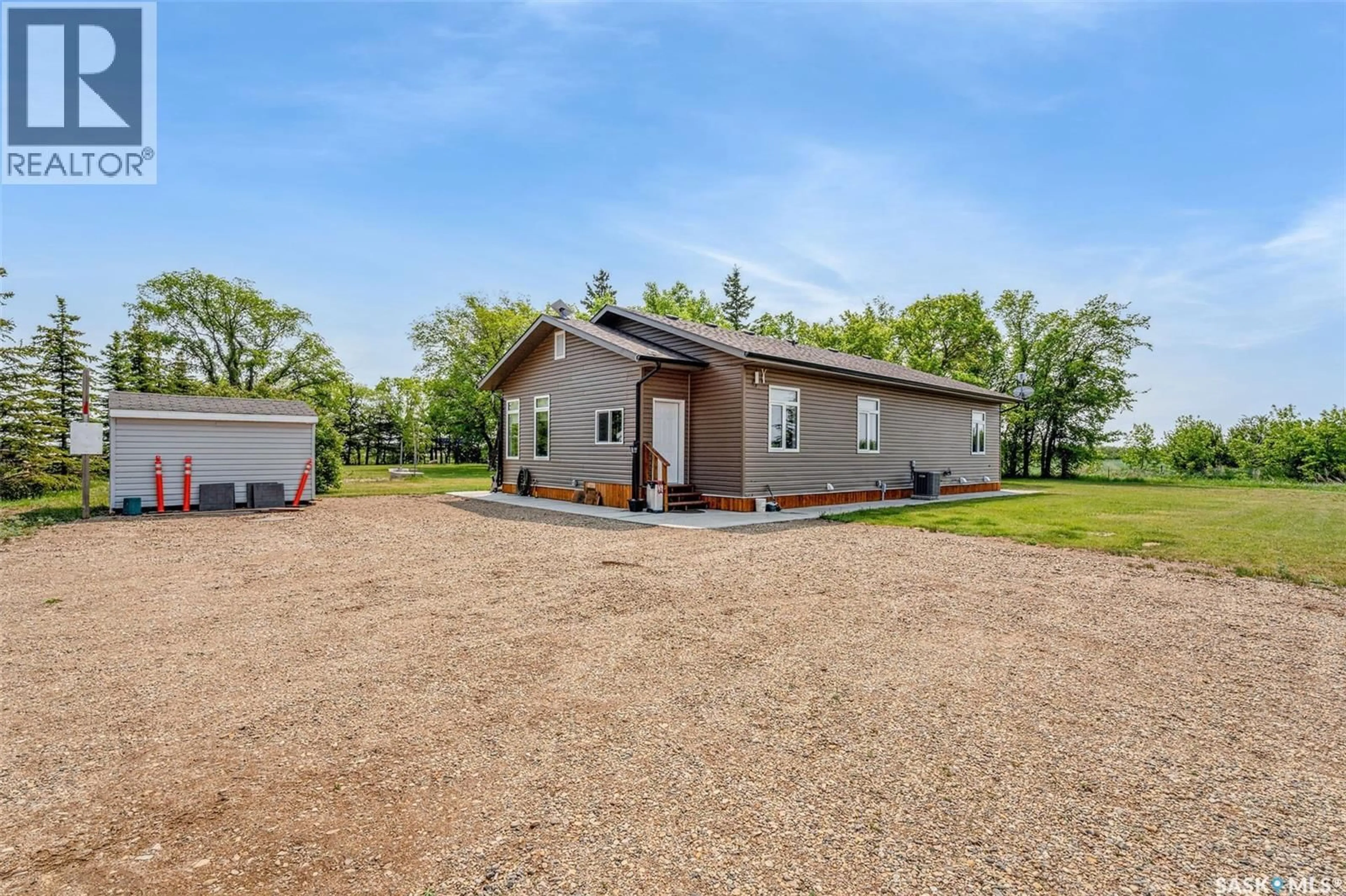 A pic from outside/outdoor area/front of a property/back of a property/a pic from drone, building for NAICAM ACREAGE, Spalding Rm No. 368 Saskatchewan S0K2Z0