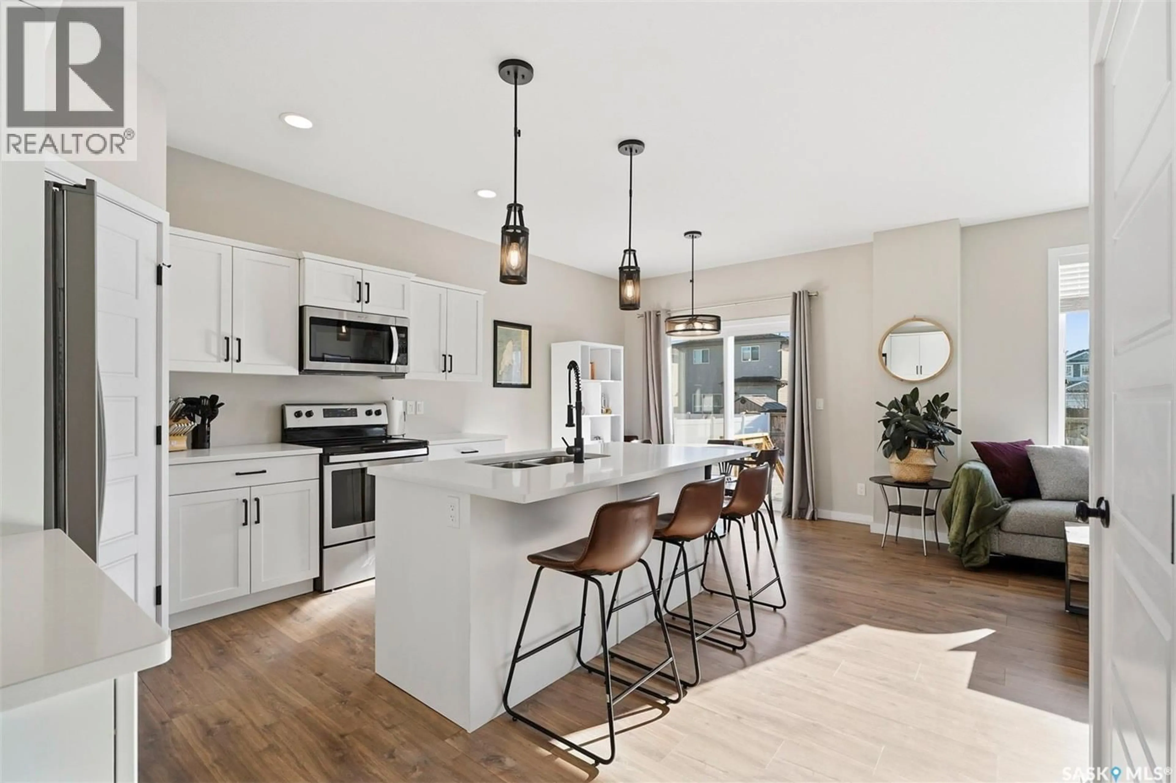 Open concept kitchen, ceramic/tile floor for 251 LABINE BEND, Saskatoon Saskatchewan S7L5Y5