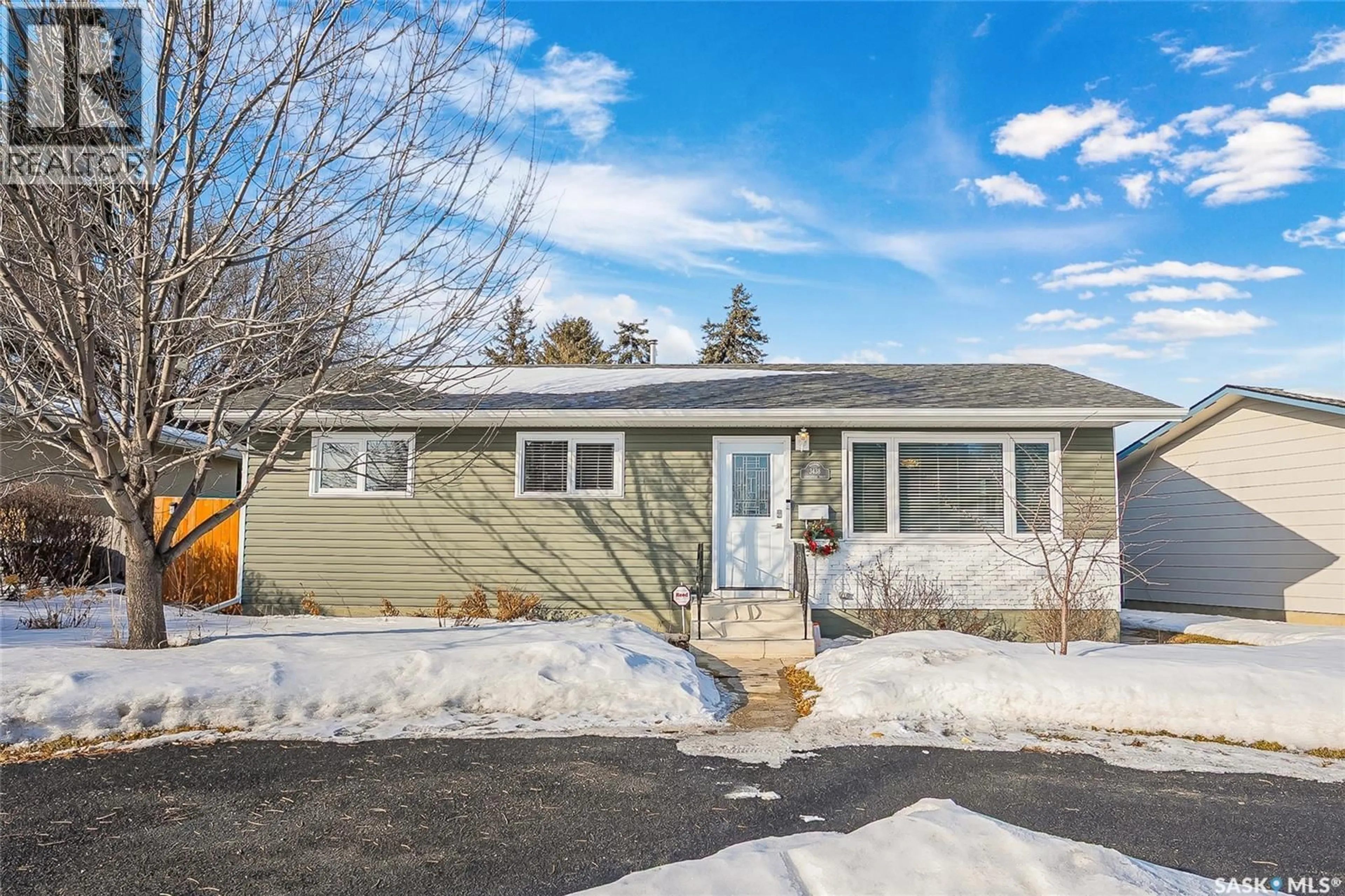 Home with vinyl exterior material, street for 3438 CENTENNIAL DRIVE, Saskatoon Saskatchewan S7L5C2