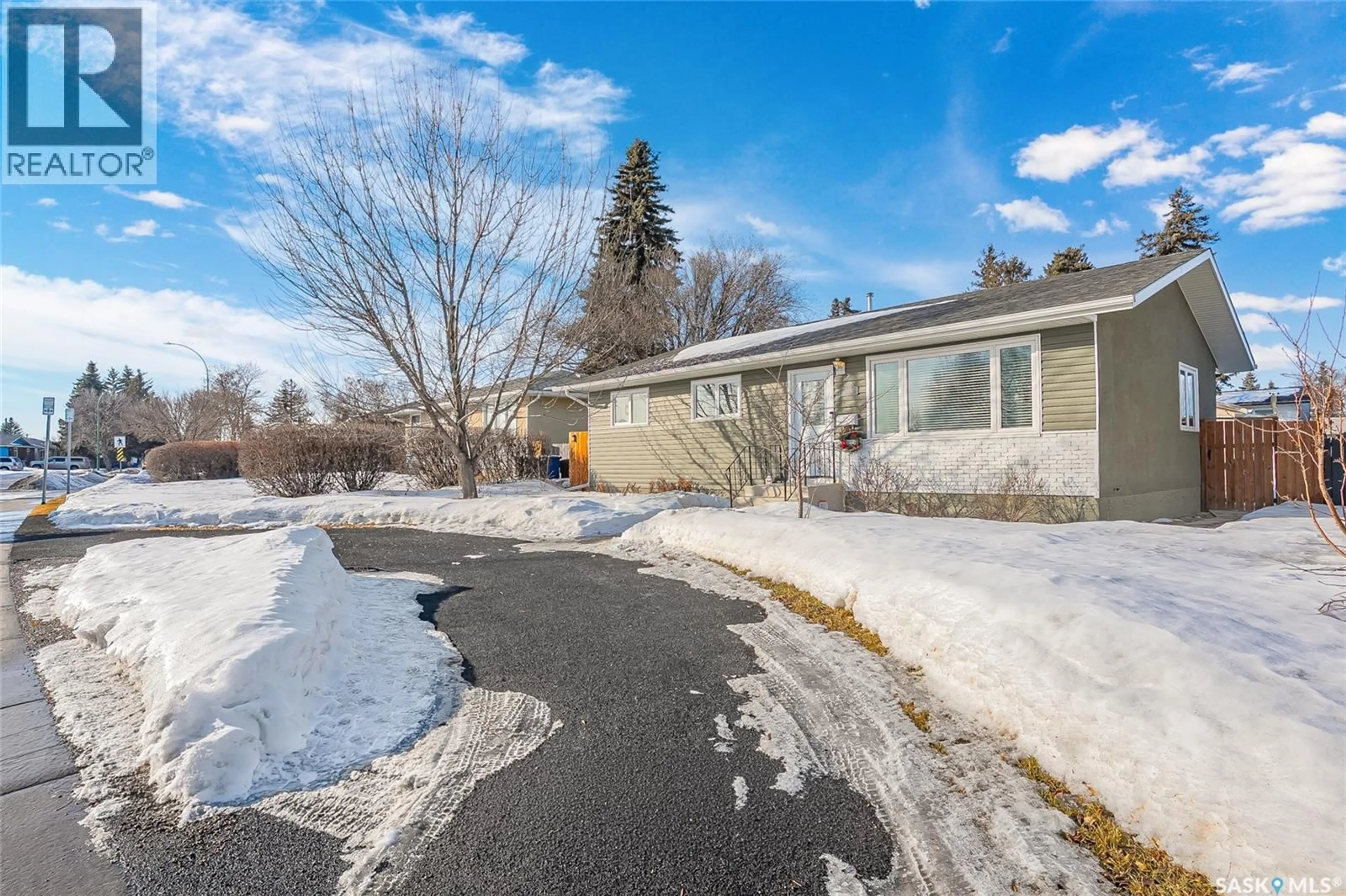 A pic from outside/outdoor area/front of a property/back of a property/a pic from drone, street for 3438 CENTENNIAL DRIVE, Saskatoon Saskatchewan S7L5C2