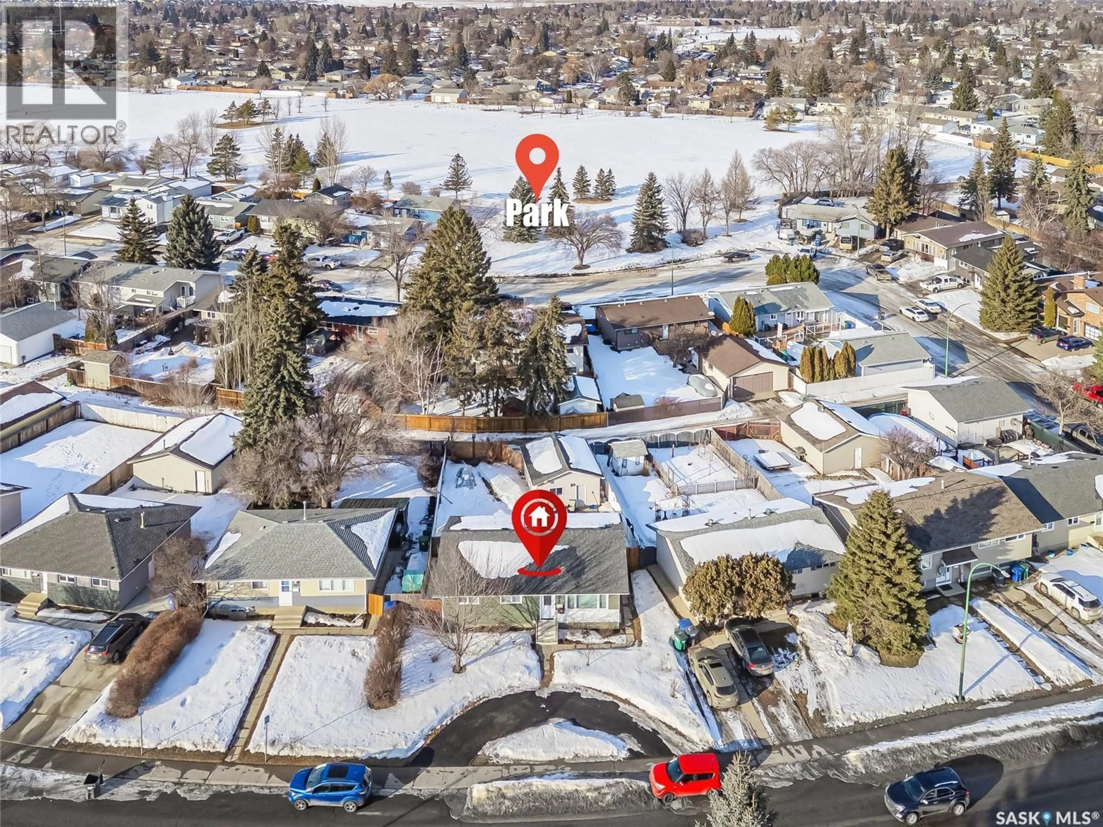 A pic from outside/outdoor area/front of a property/back of a property/a pic from drone, street for 3438 CENTENNIAL DRIVE, Saskatoon Saskatchewan S7L5C2