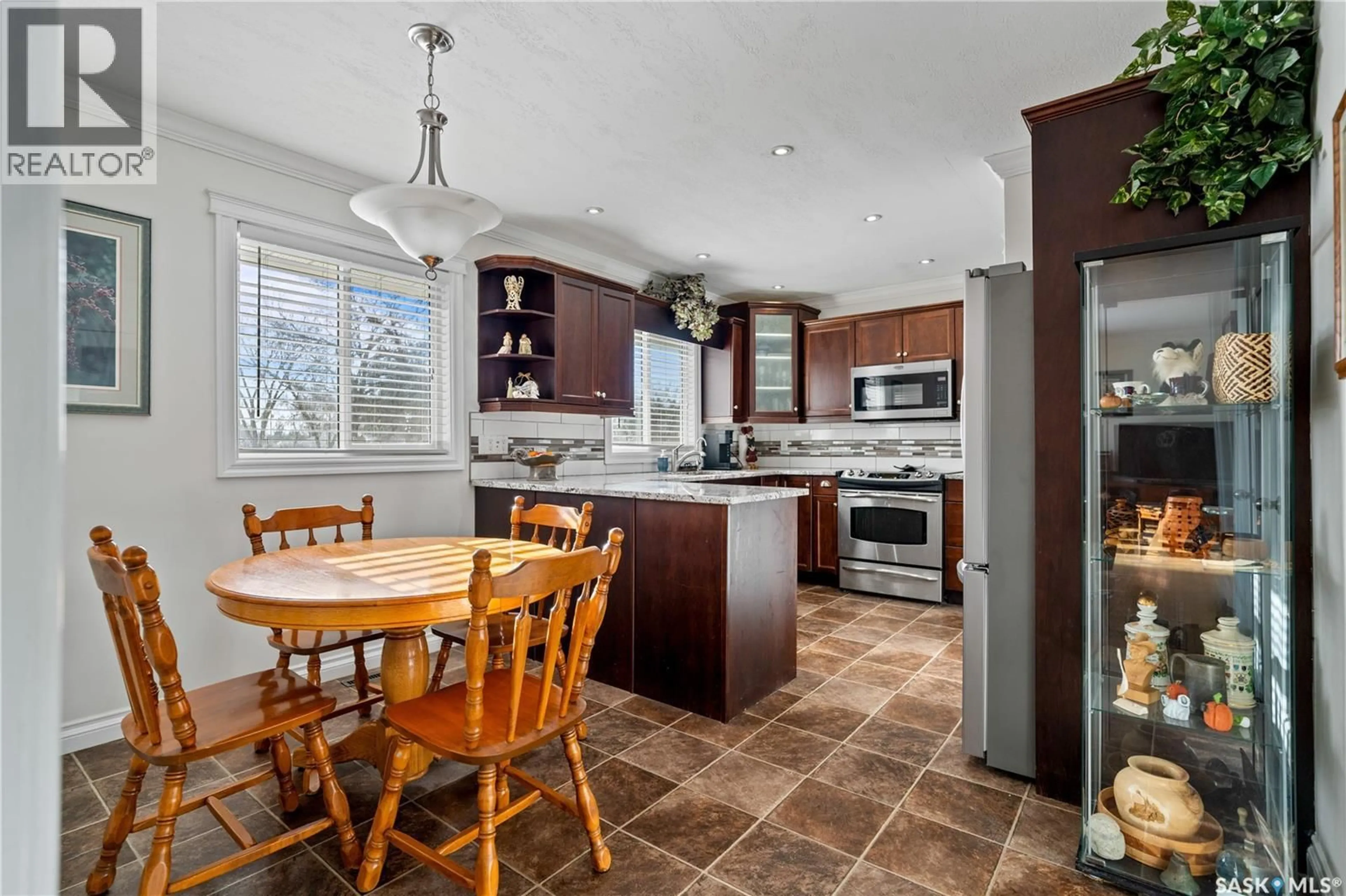 Open concept kitchen, ceramic/tile floor for 5024 1ST AVENUE, Regina Saskatchewan S4T0A5