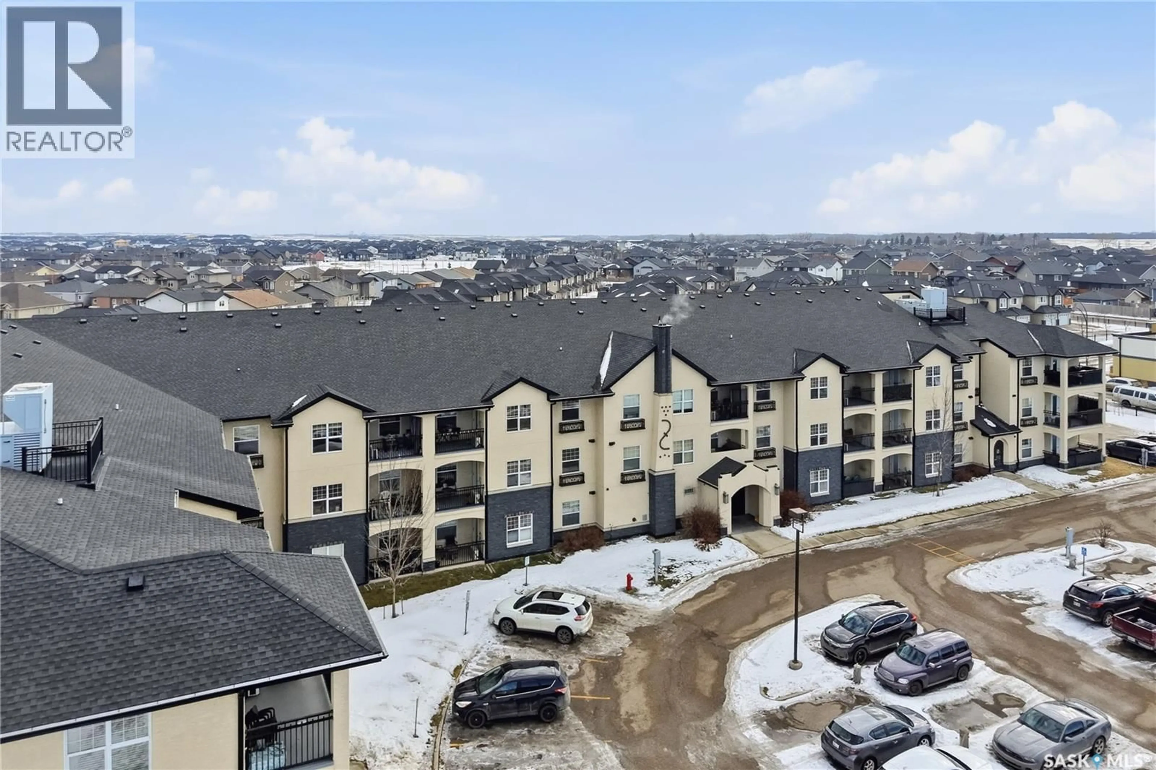 A pic from outside/outdoor area/front of a property/back of a property/a pic from drone, mountain view for 211 - 319 LEDINGHAM STREET, Saskatoon Saskatchewan S7V0C5