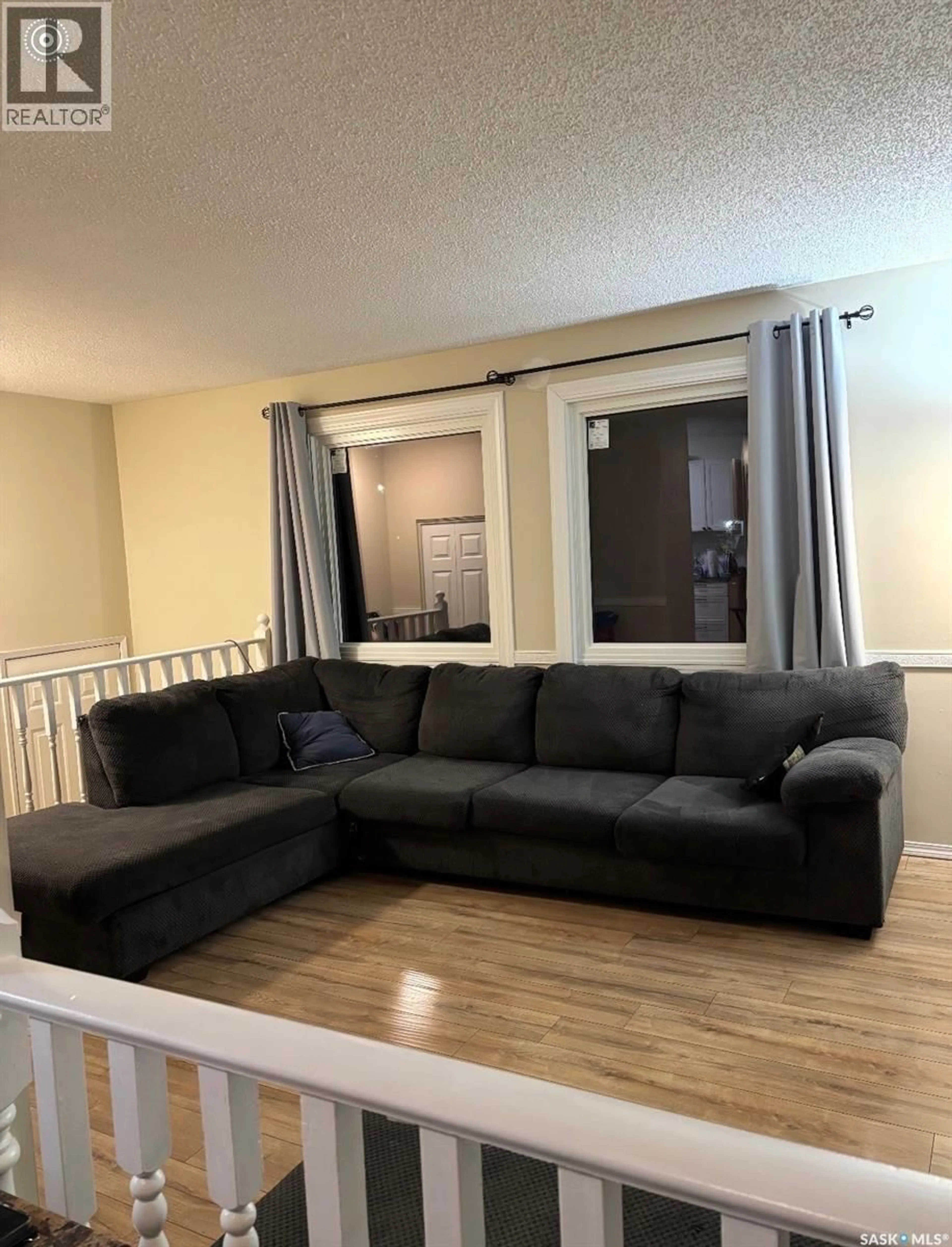 Living room with furniture, unknown for 19 HUNT CRESCENT, Regina Saskatchewan S4N5K7