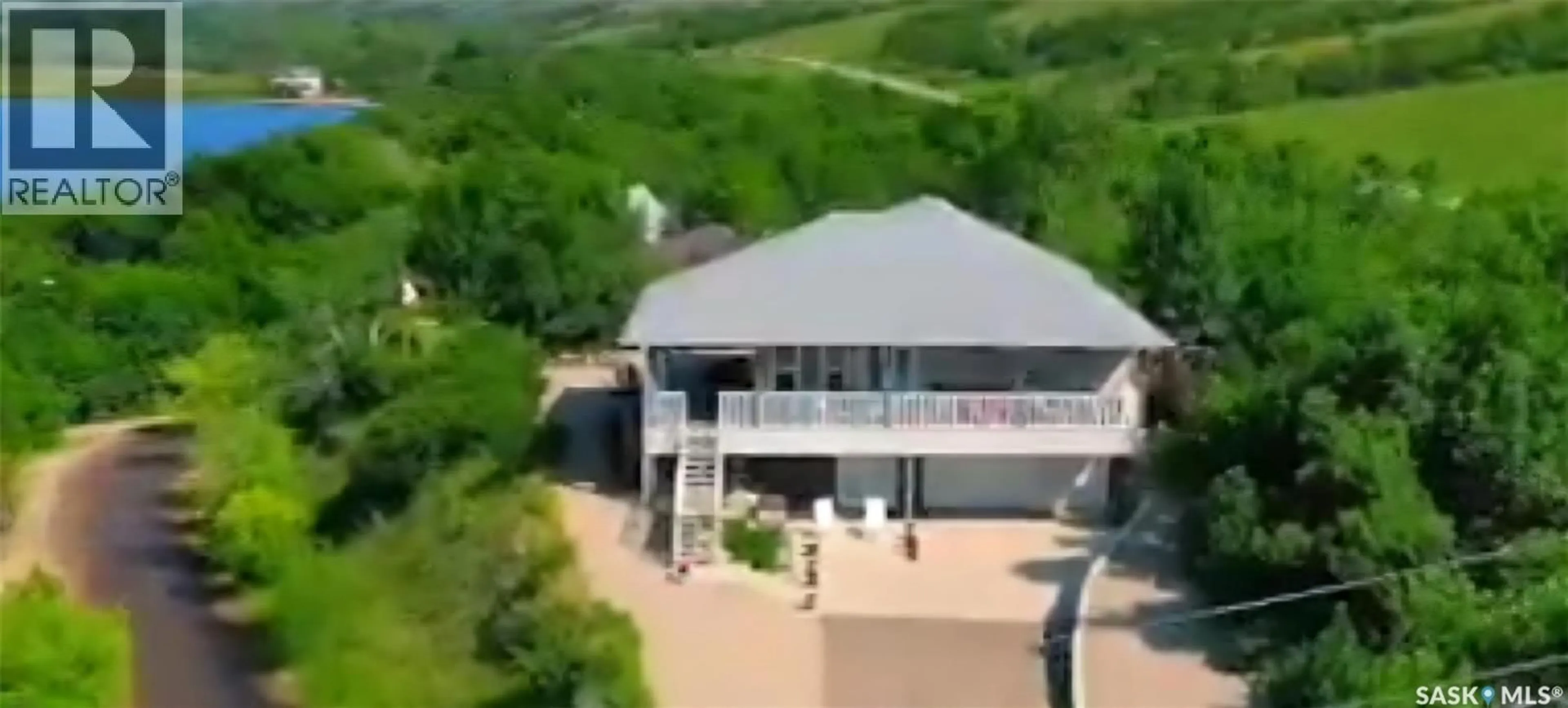 A pic from outside/outdoor area/front of a property/back of a property/a pic from drone, building for 207 CRIDDLE AVENUE, Crooked Lake Saskatchewan S0G2B0