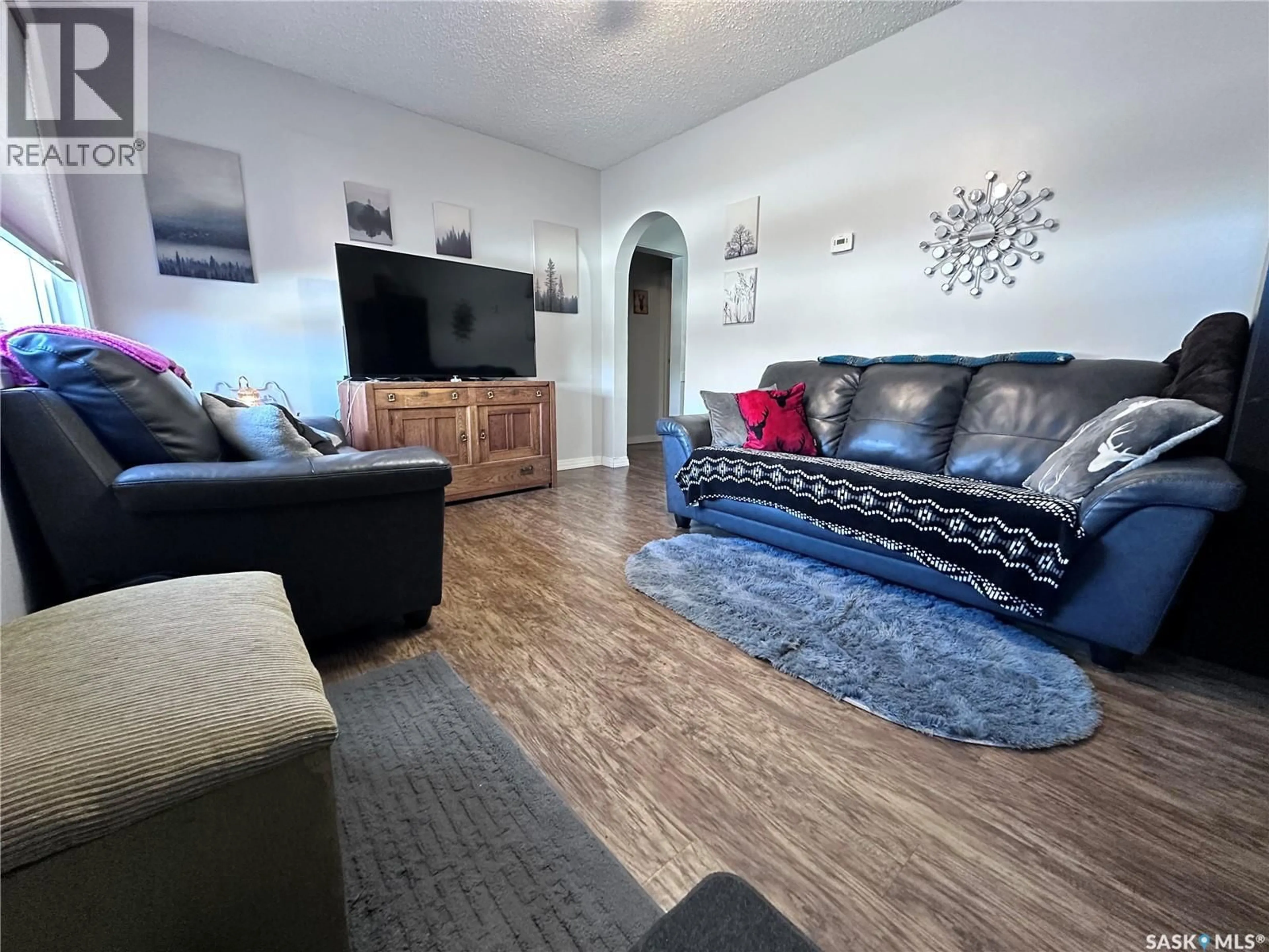 Living room with furniture, unknown for 561 105TH STREET, North Battleford Saskatchewan S9A1R6