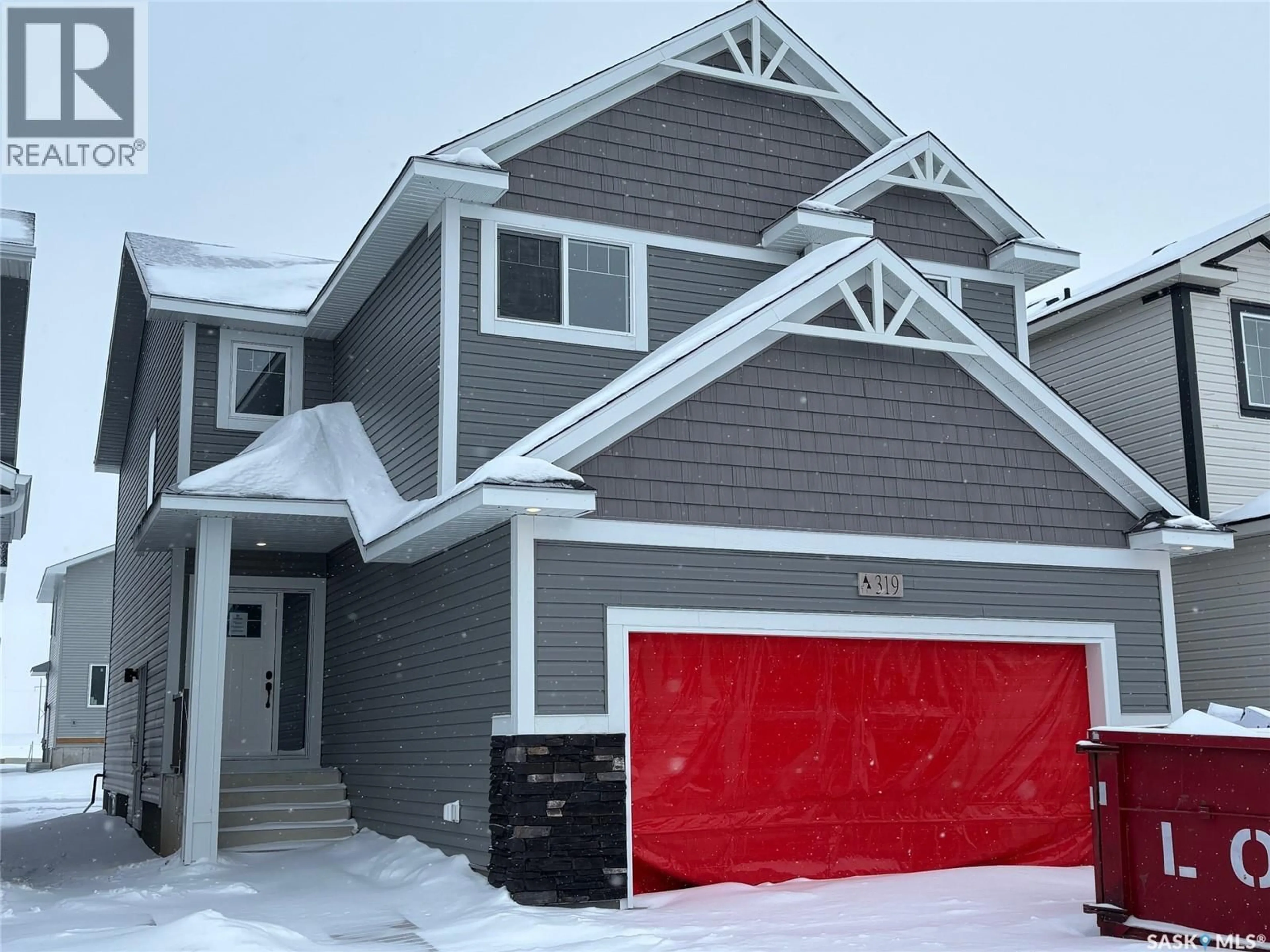 Home with vinyl exterior material, street for 363 ASOKAN BEND, Saskatoon Saskatchewan S7V1V8