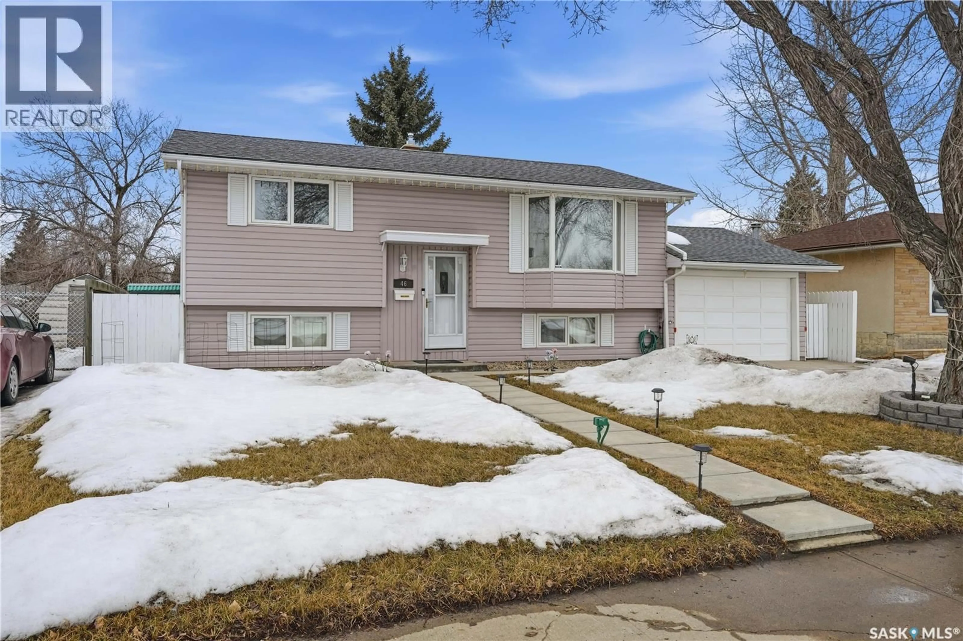 Home with vinyl exterior material, street for 46 LYONS STREET, Regina Saskatchewan S4T6G2