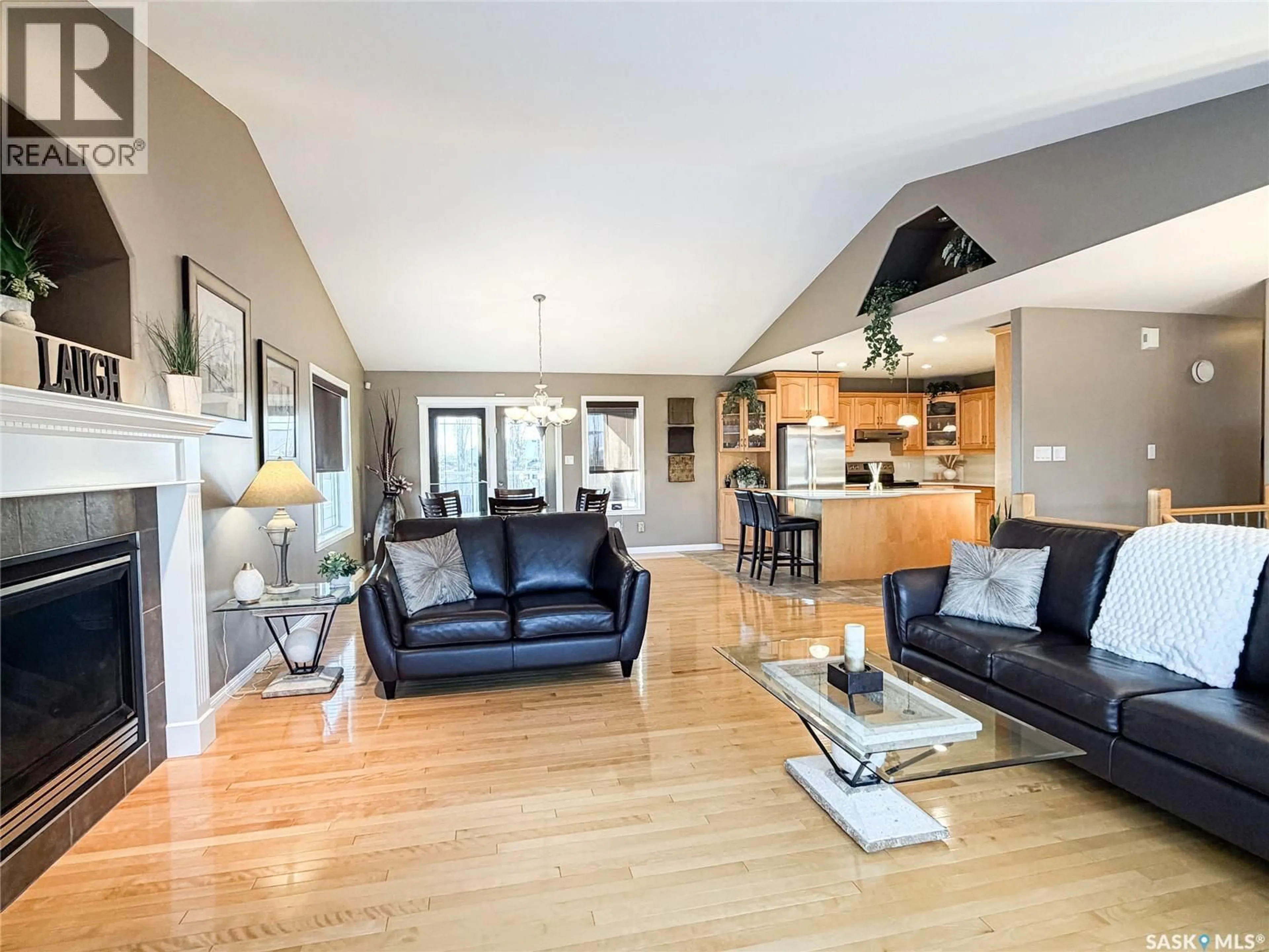 Living room with furniture, wood/laminate floor for 3 BRIDGER DRIVE, Meadow Lake Saskatchewan S9X2A1