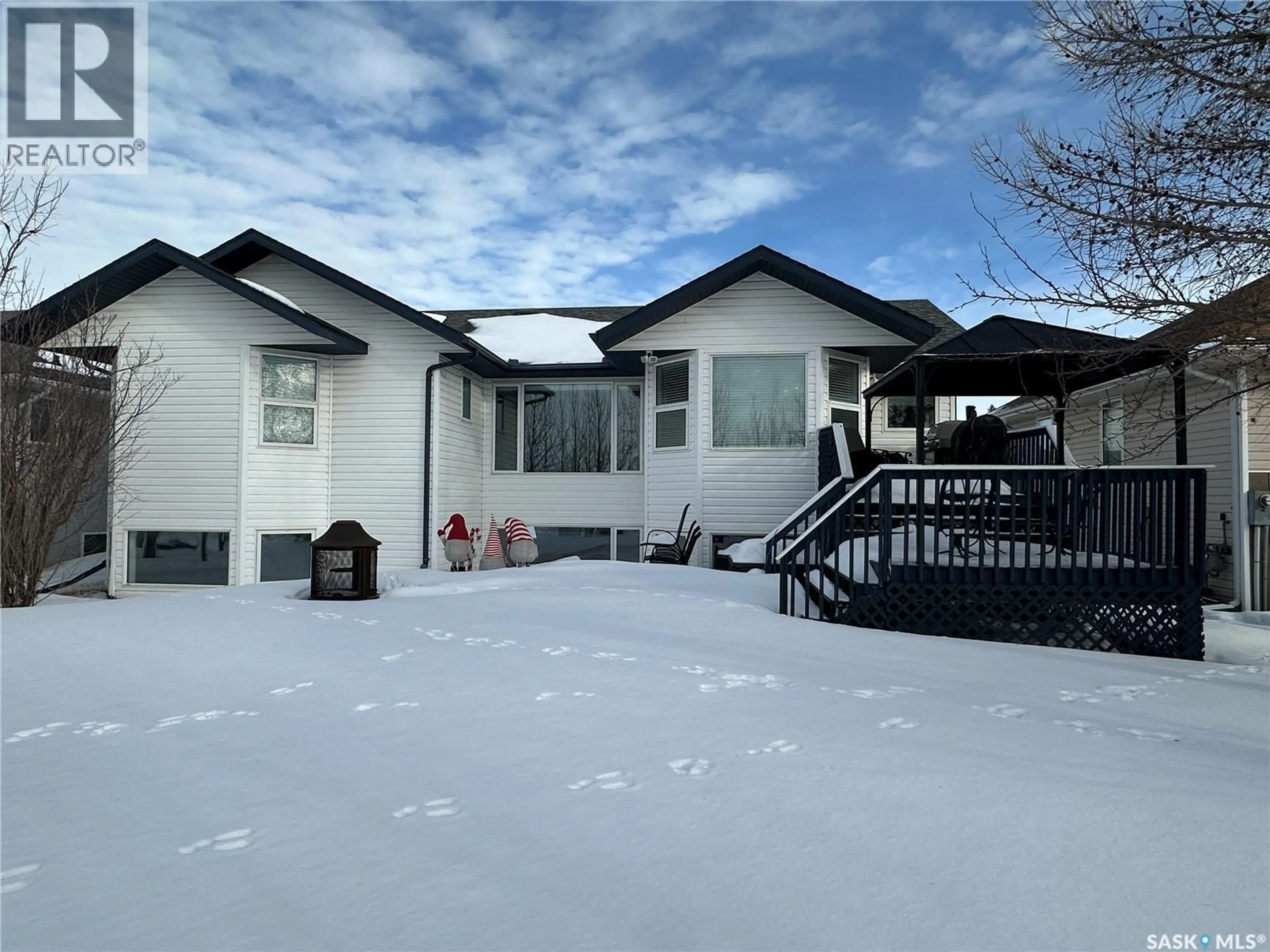Home with vinyl exterior material, street for 2117 NEW MARKET DRIVE, Tisdale Saskatchewan S0E1T0