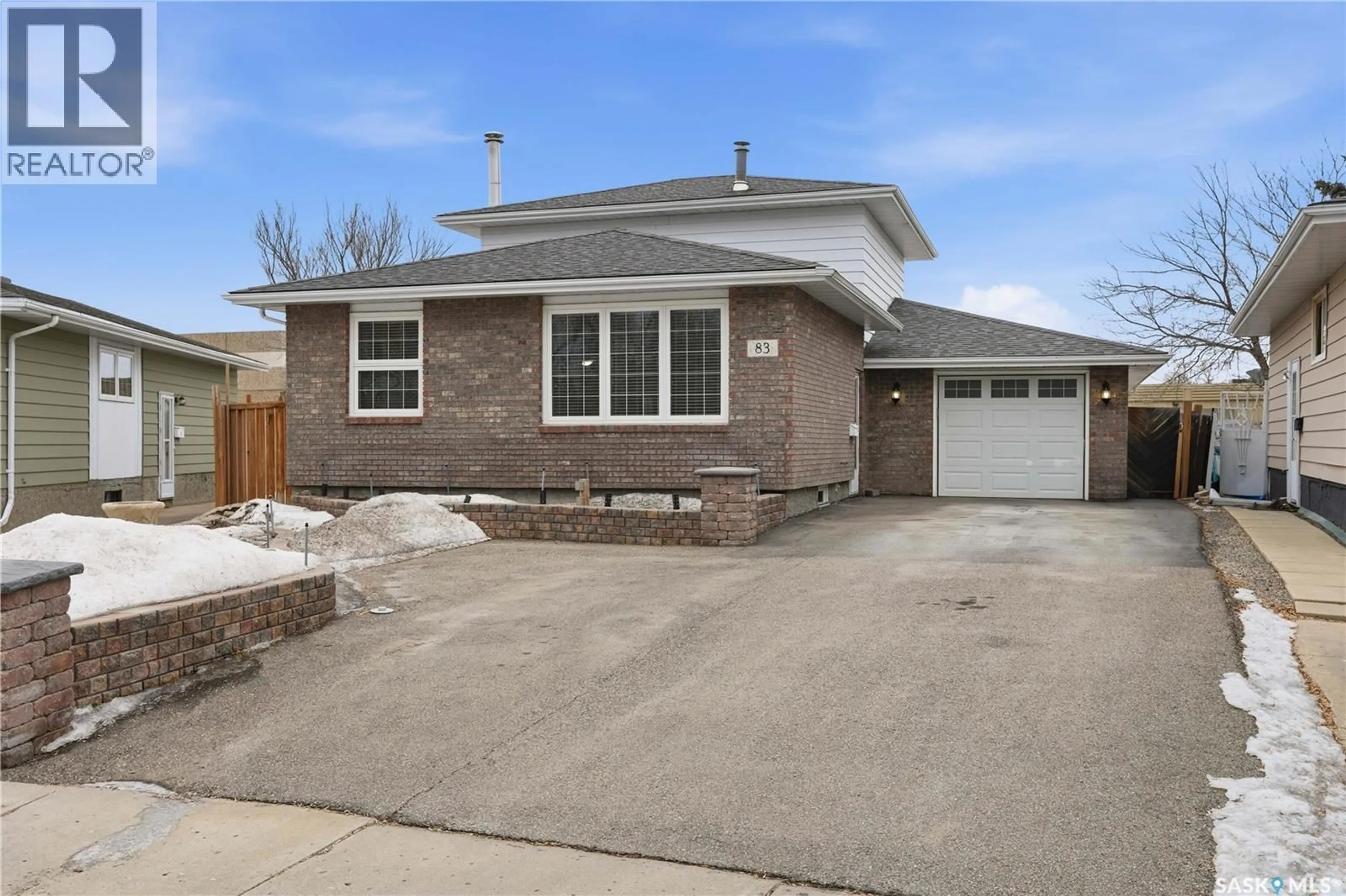 Home with brick exterior material, street for 83 CARTER CRESCENT, Regina Saskatchewan S4X2C8