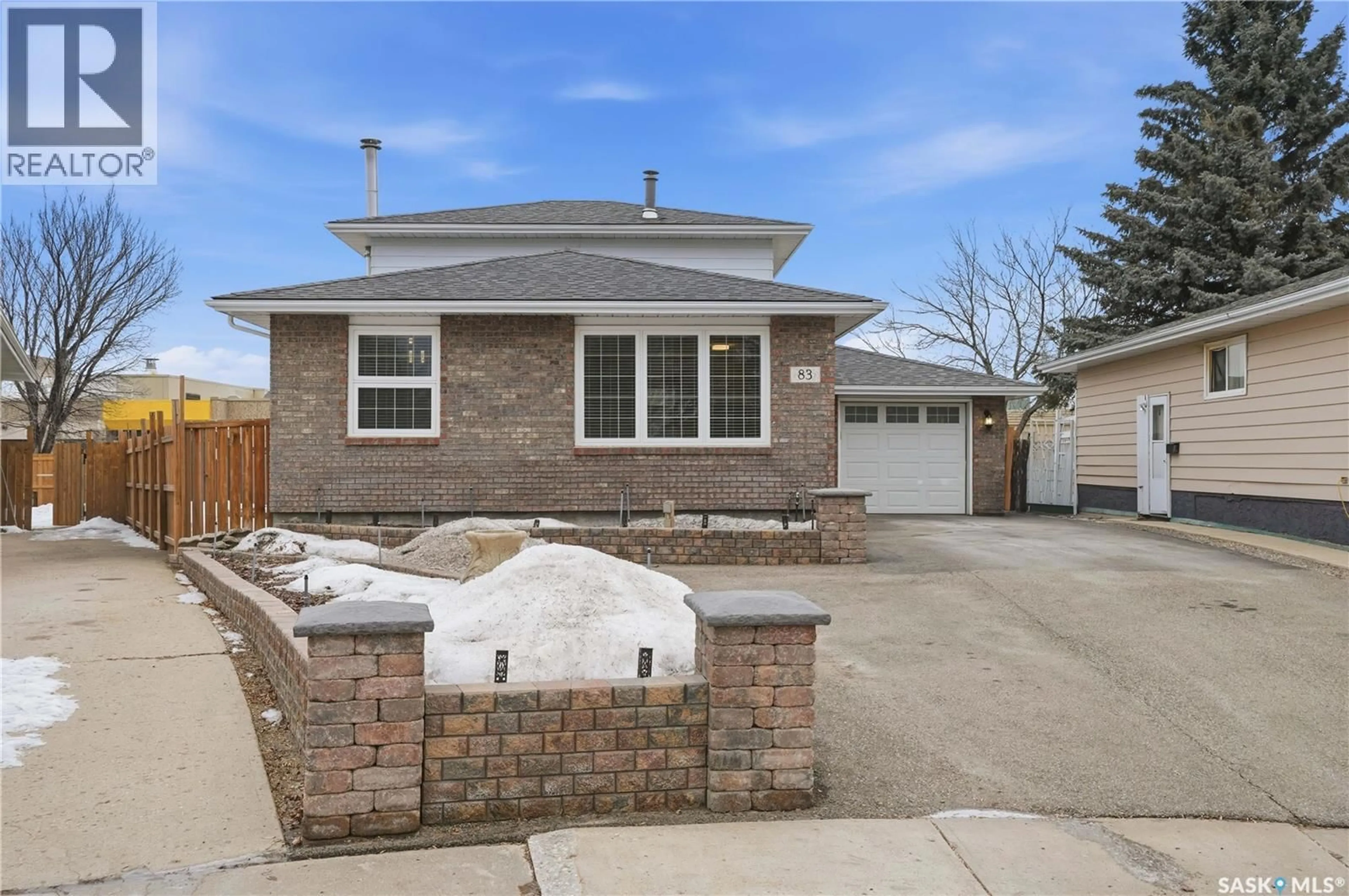 Home with brick exterior material, street for 83 CARTER CRESCENT, Regina Saskatchewan S4X2C8