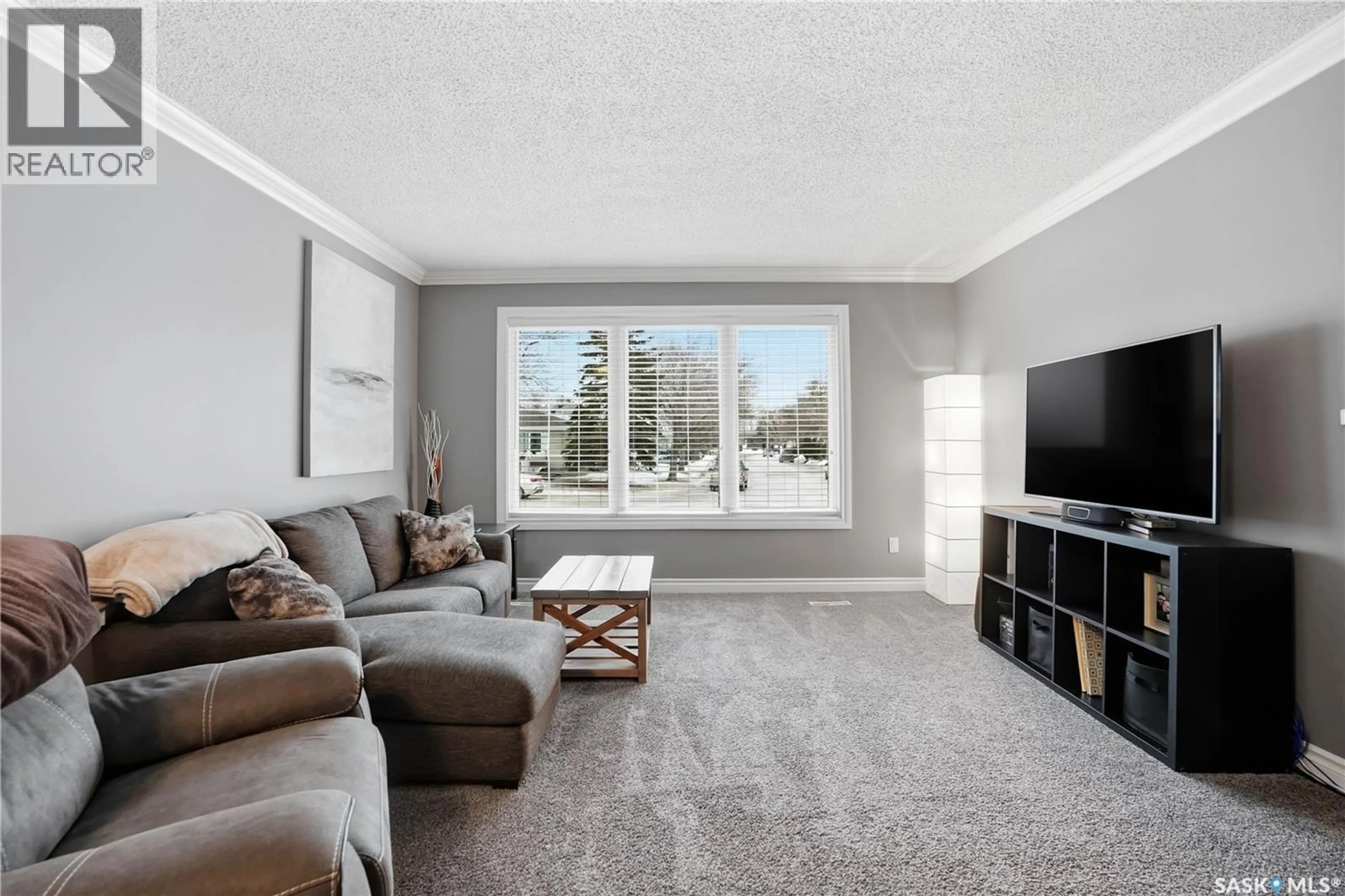 Living room with furniture, unknown for 83 CARTER CRESCENT, Regina Saskatchewan S4X2C8