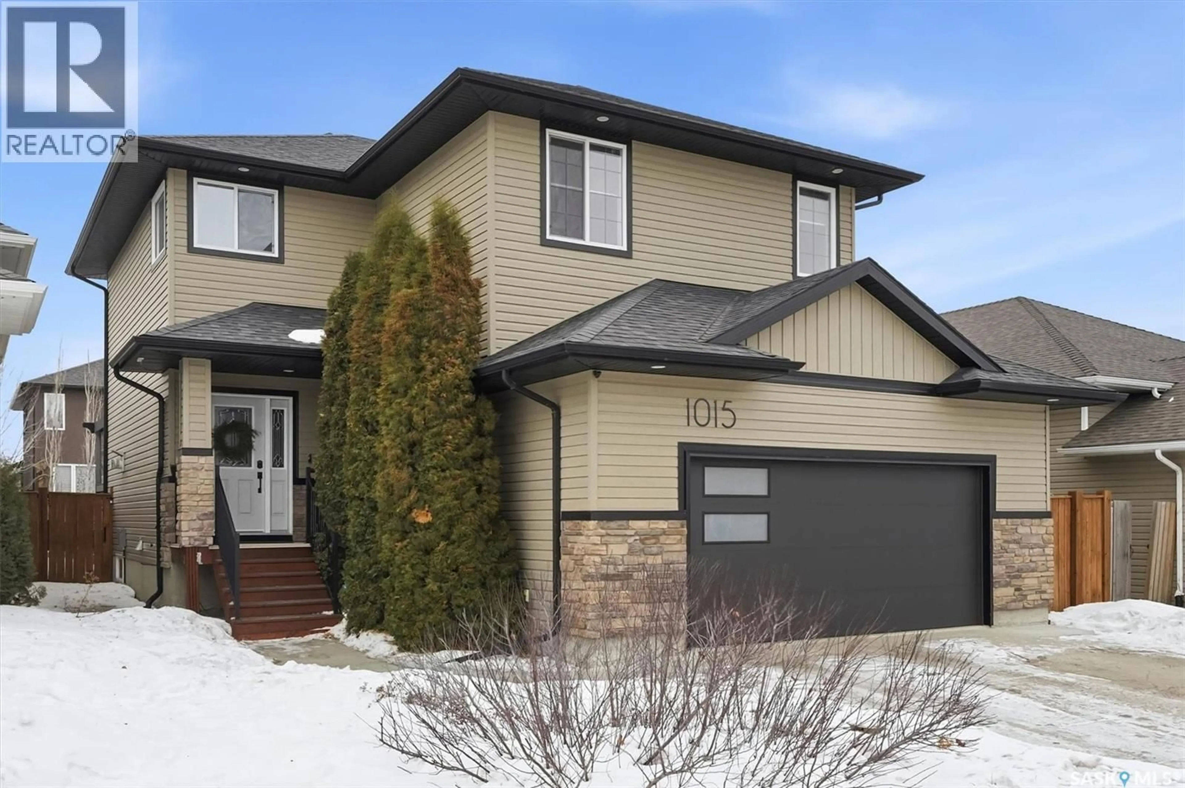 Home with brick exterior material, street for 1015 MUZYKA ROAD, Saskatoon Saskatchewan S7W0E7