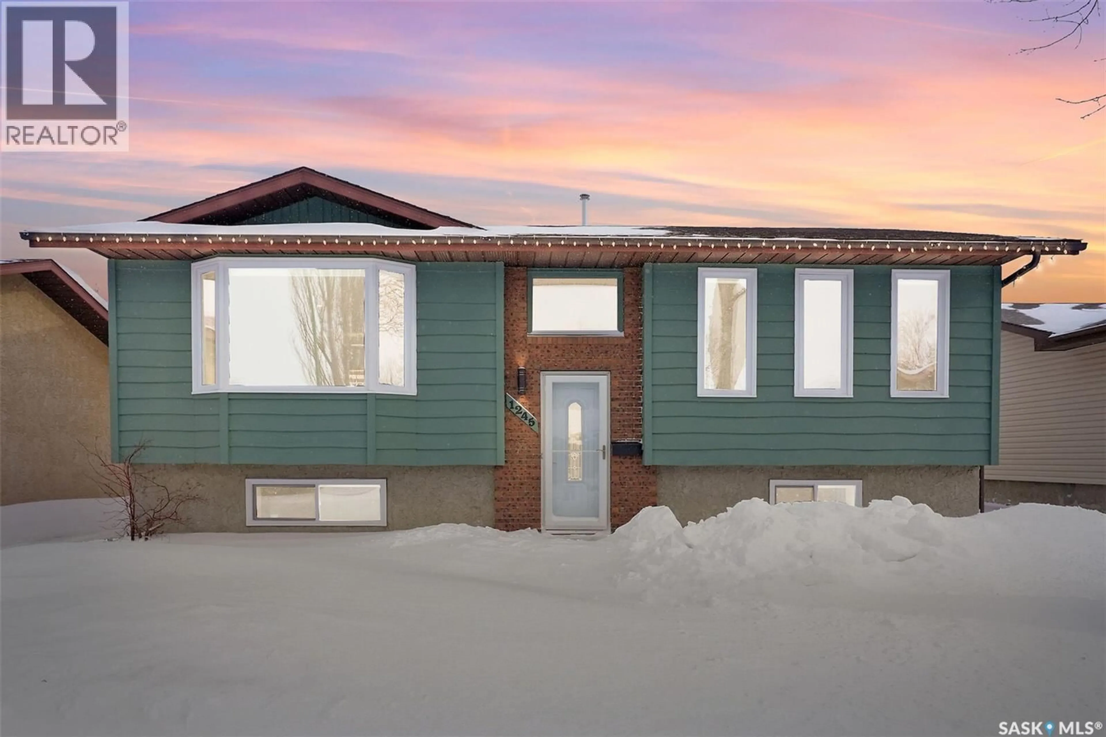 Home with vinyl exterior material, street for 1245 RUNCIMAN CRESCENT, Regina Saskatchewan S4X2Z3