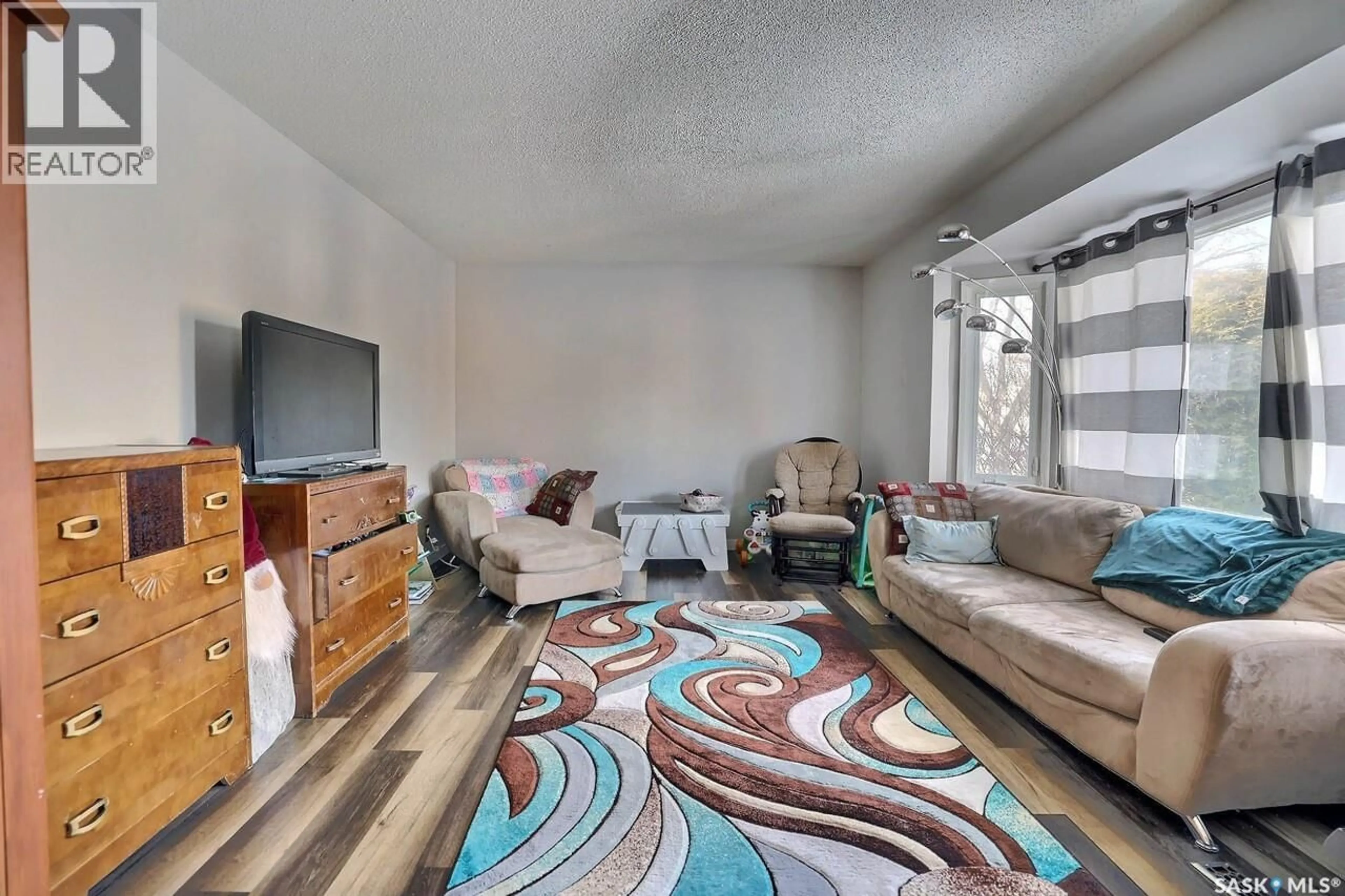 Living room with furniture, unknown for 61 BANNISTER AVENUE, Regina Saskatchewan S4R5K8