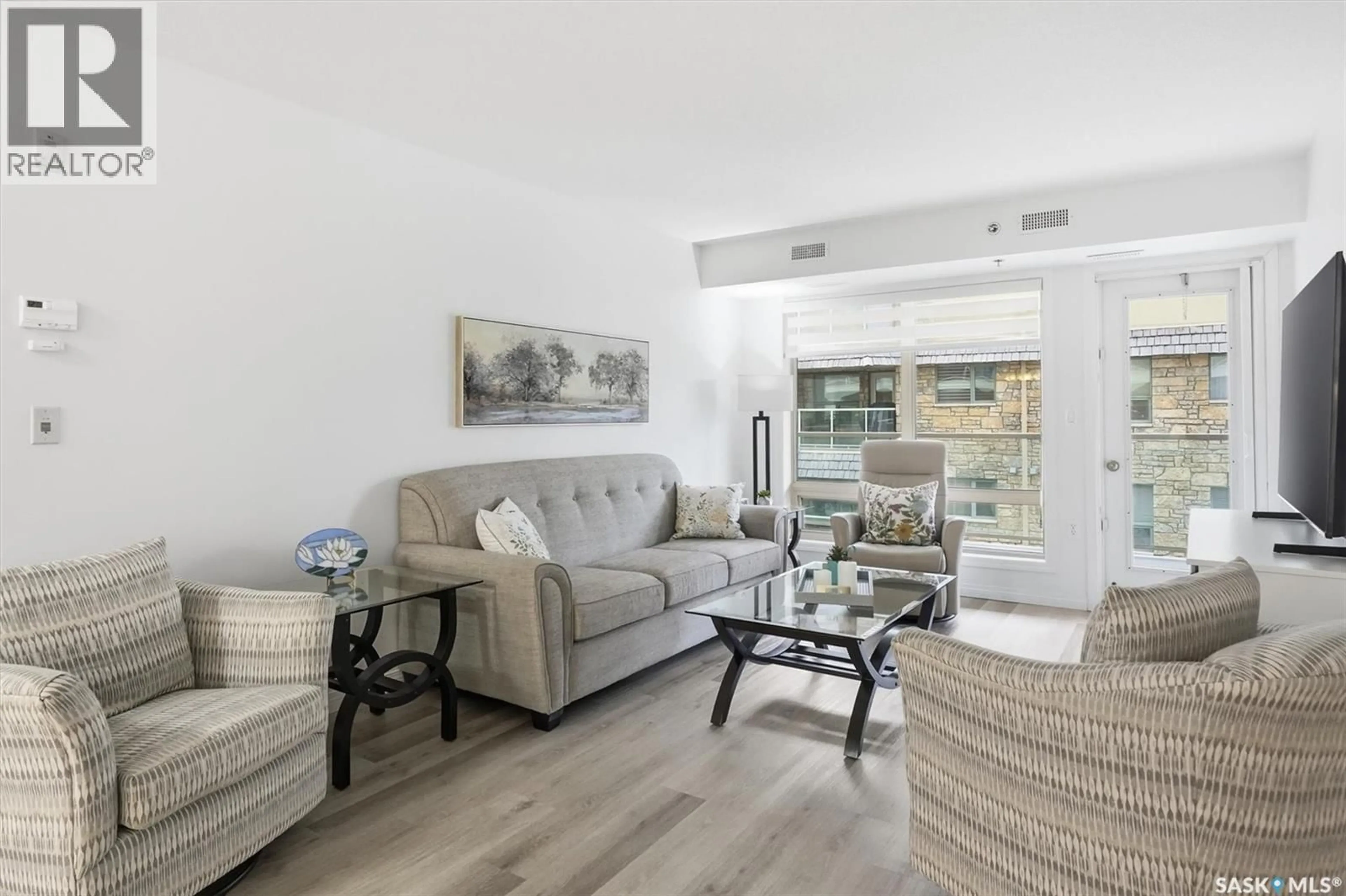 Living room with furniture, unknown for 305 - 2221 ADELAIDE STREET, Saskatoon Saskatchewan S7J5L9