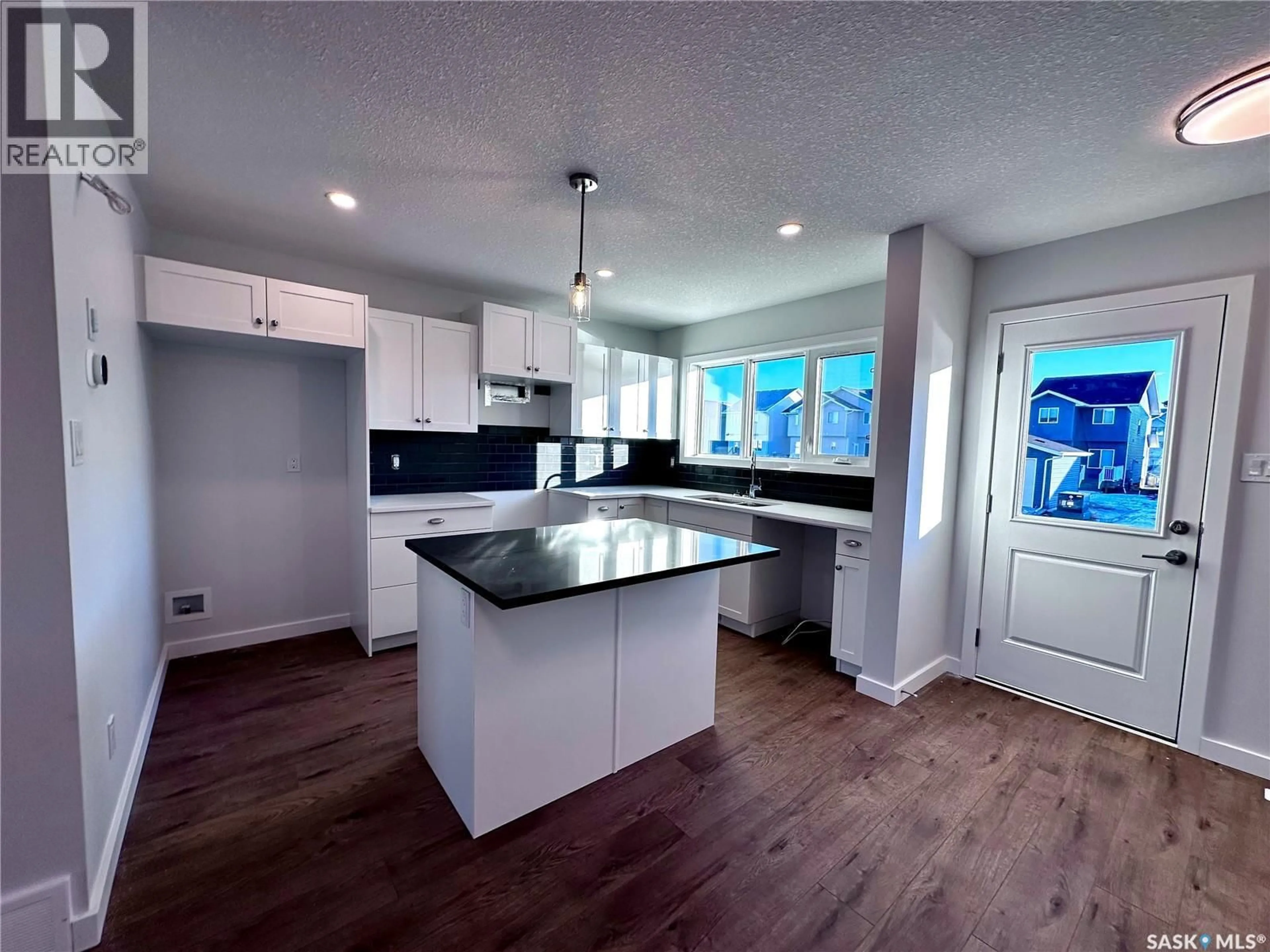 Open concept kitchen, unknown for 5457 BUCKINGHAM DRIVE, Regina Saskatchewan S4V4B5