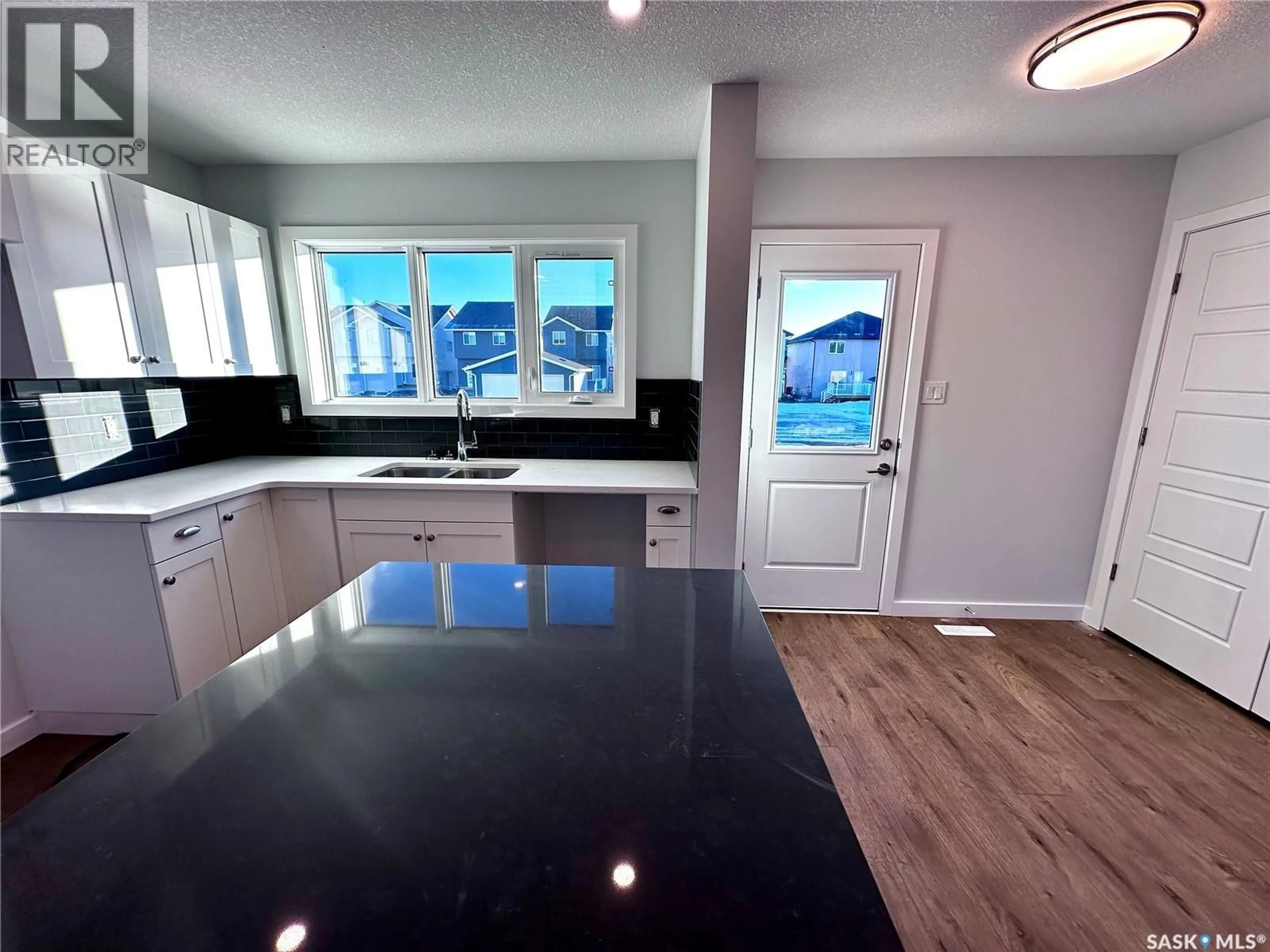 Open concept kitchen, unknown for 5457 BUCKINGHAM DRIVE, Regina Saskatchewan S4V4B5