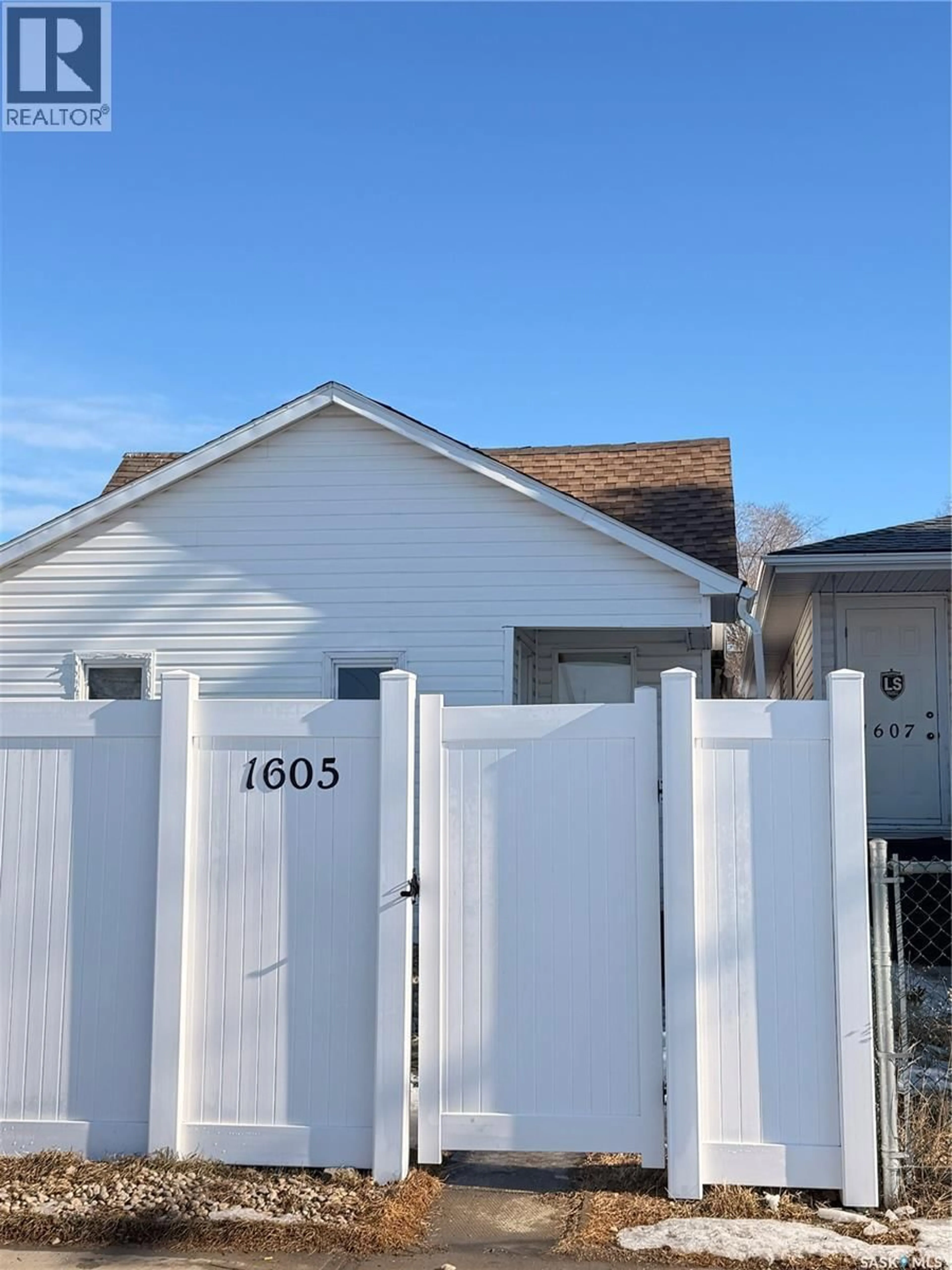 Home with vinyl exterior material, street for 1605 RETALLACK STREET, Regina Saskatchewan S4T2J6