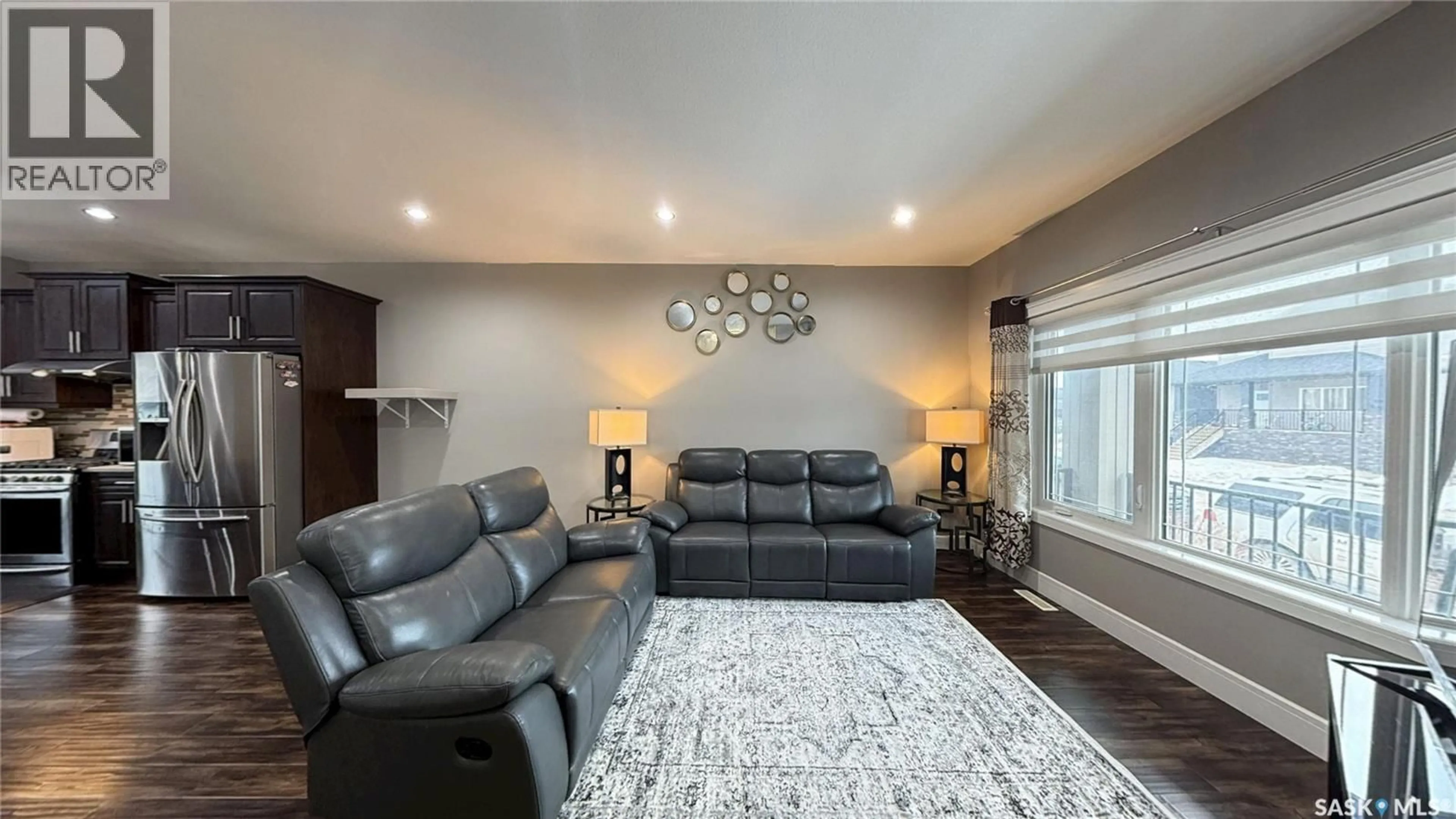 Living room with furniture, unknown for 414 ELLS WAY, Saskatoon Saskatchewan S7L6K6