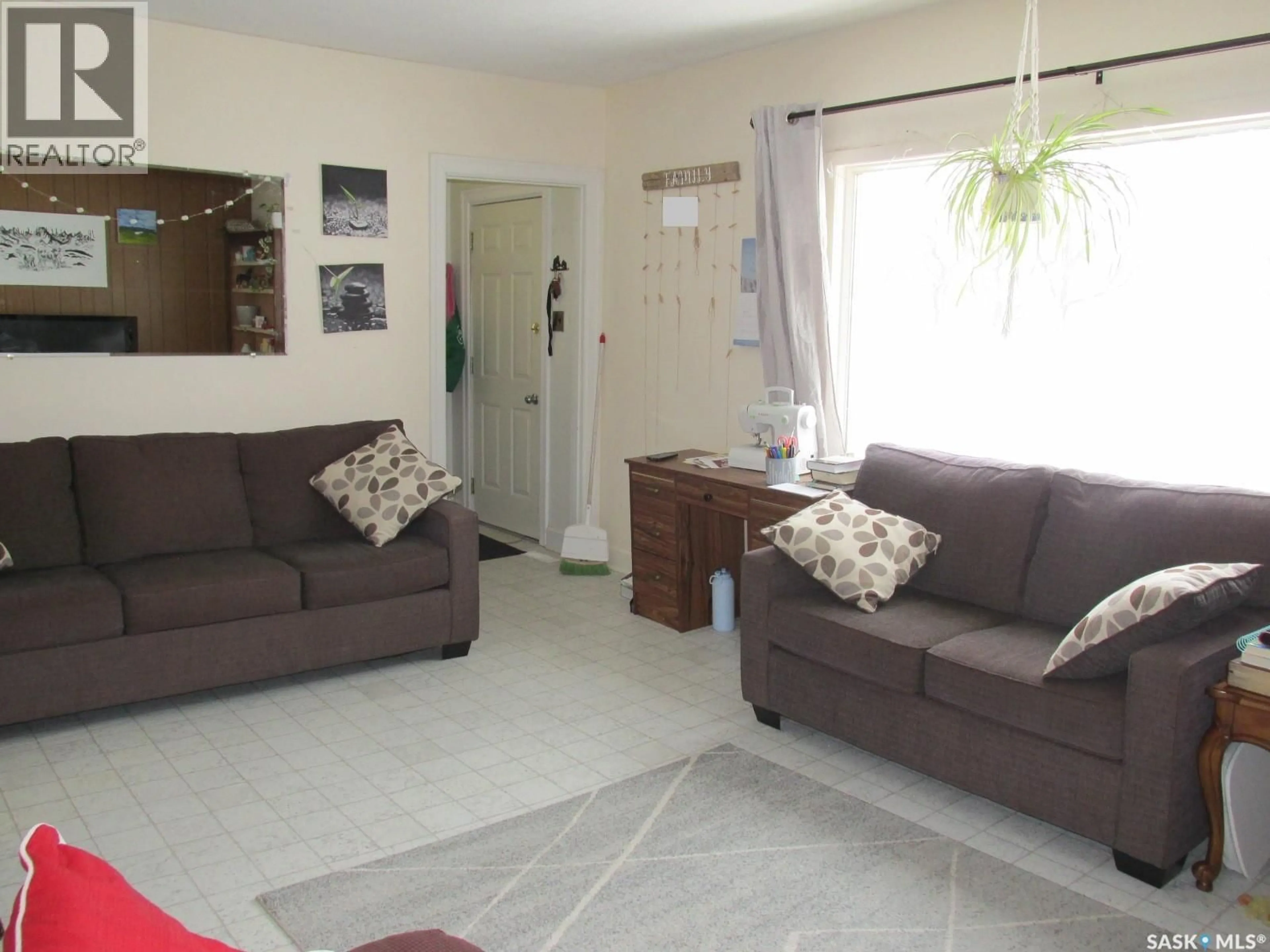 Living room with furniture, unknown for 413 1ST STREET, Nipawin Saskatchewan S0E1E0