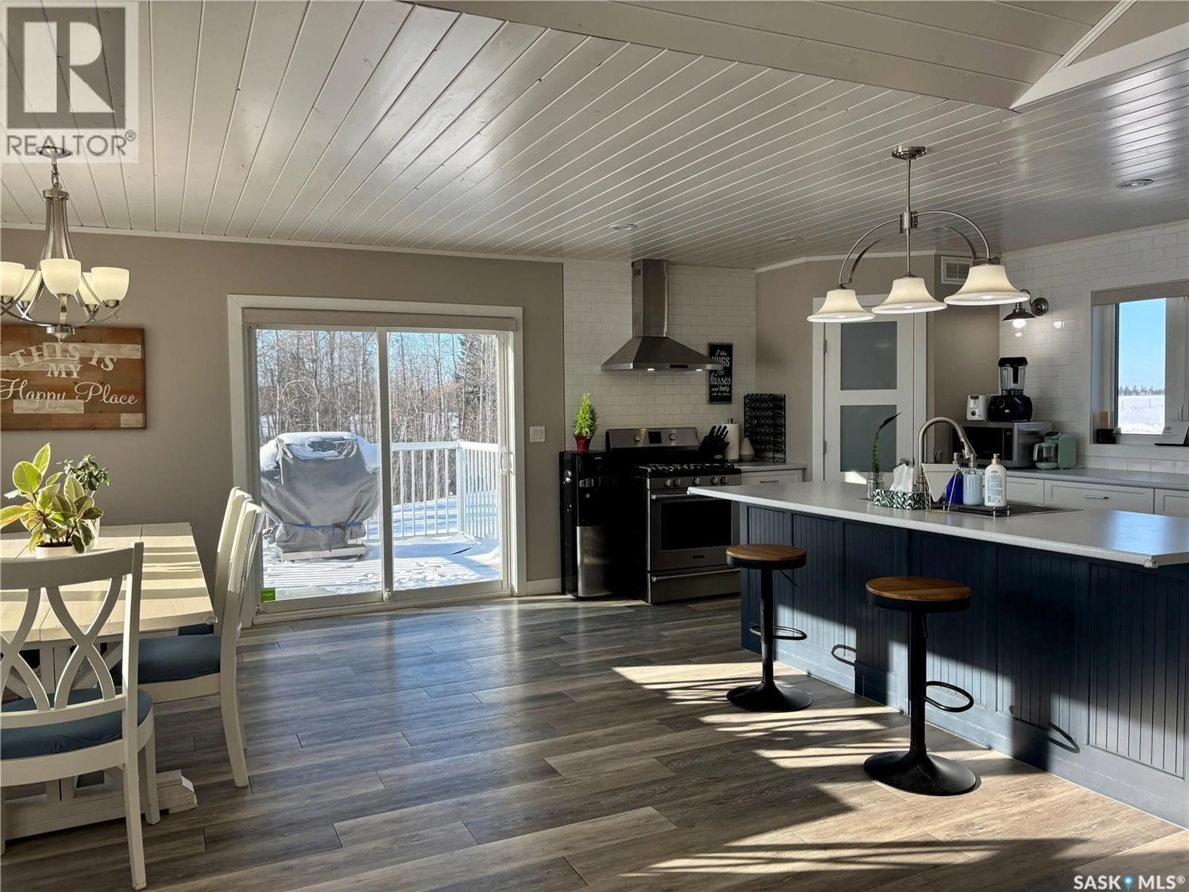 Open concept kitchen, wood/laminate floor for 14 CRESCENT BAY ROAD, Canwood Rm No. 494 Saskatchewan S0J0K0