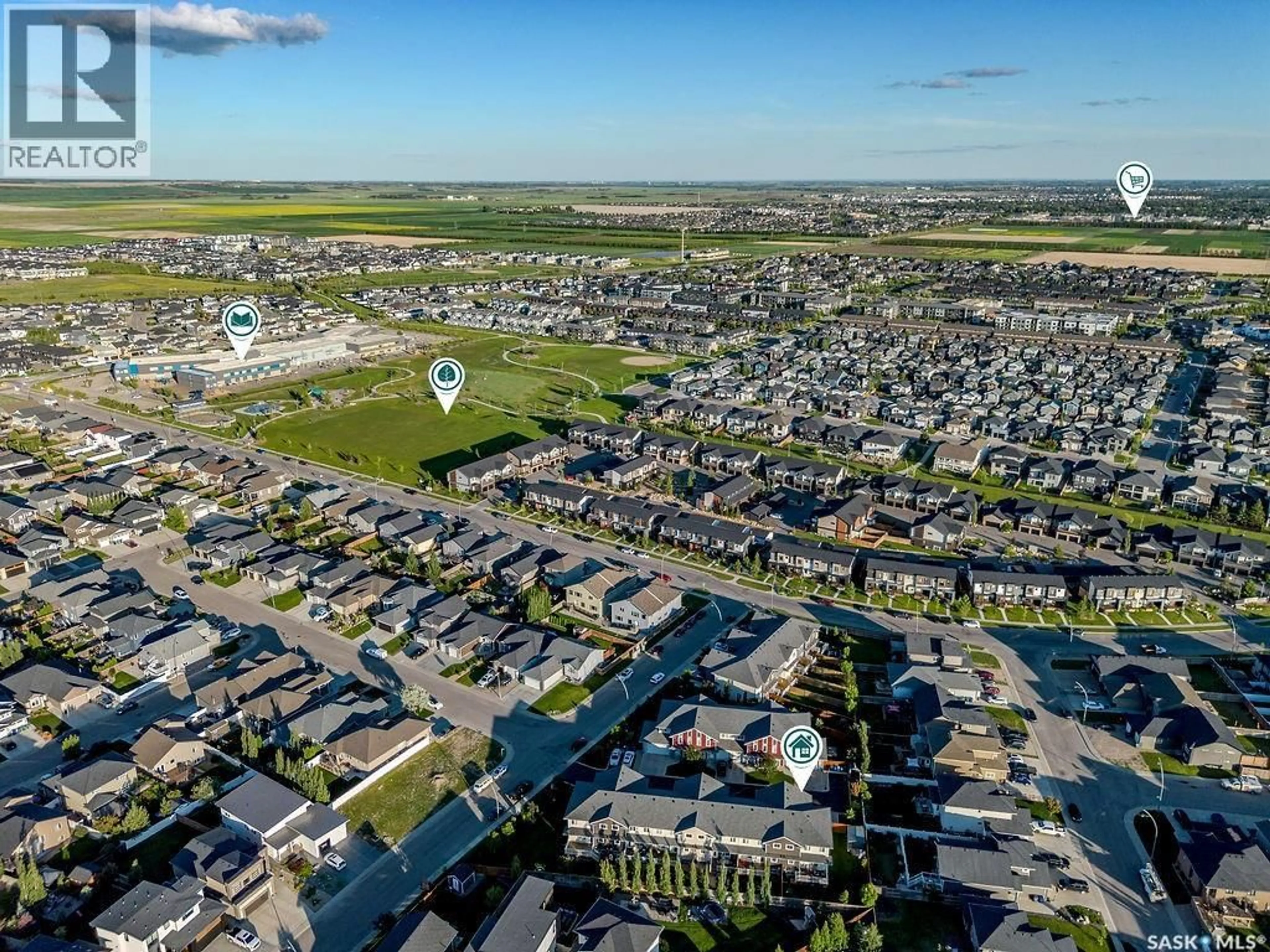 A pic from outside/outdoor area/front of a property/back of a property/a pic from drone, street for 311 115 SALLOUM CRESCENT, Saskatoon Saskatchewan S7W0V1