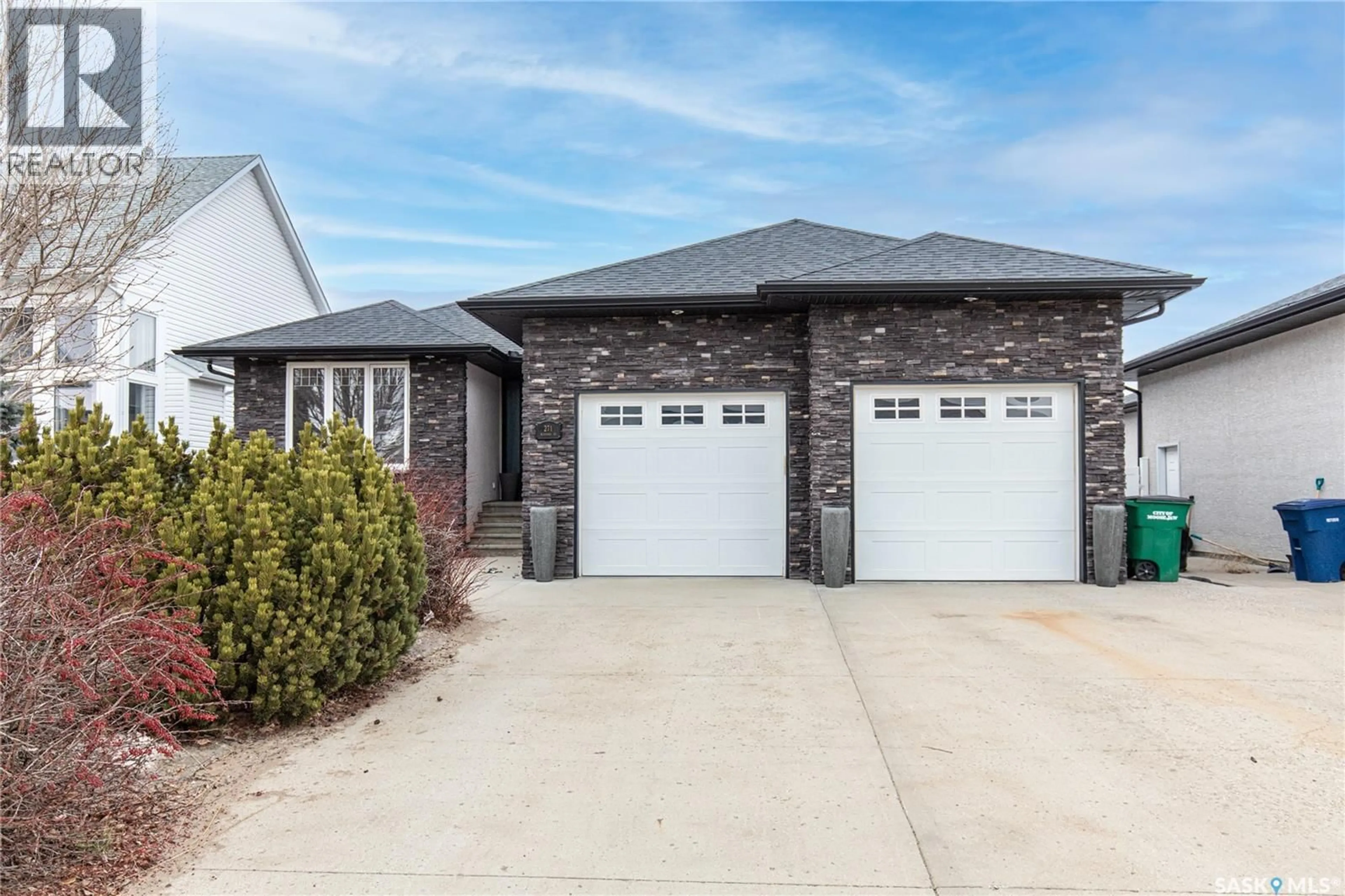 Home with brick exterior material, street for 271 BLUE SAGE DRIVE, Moose Jaw Saskatchewan S6J1N5