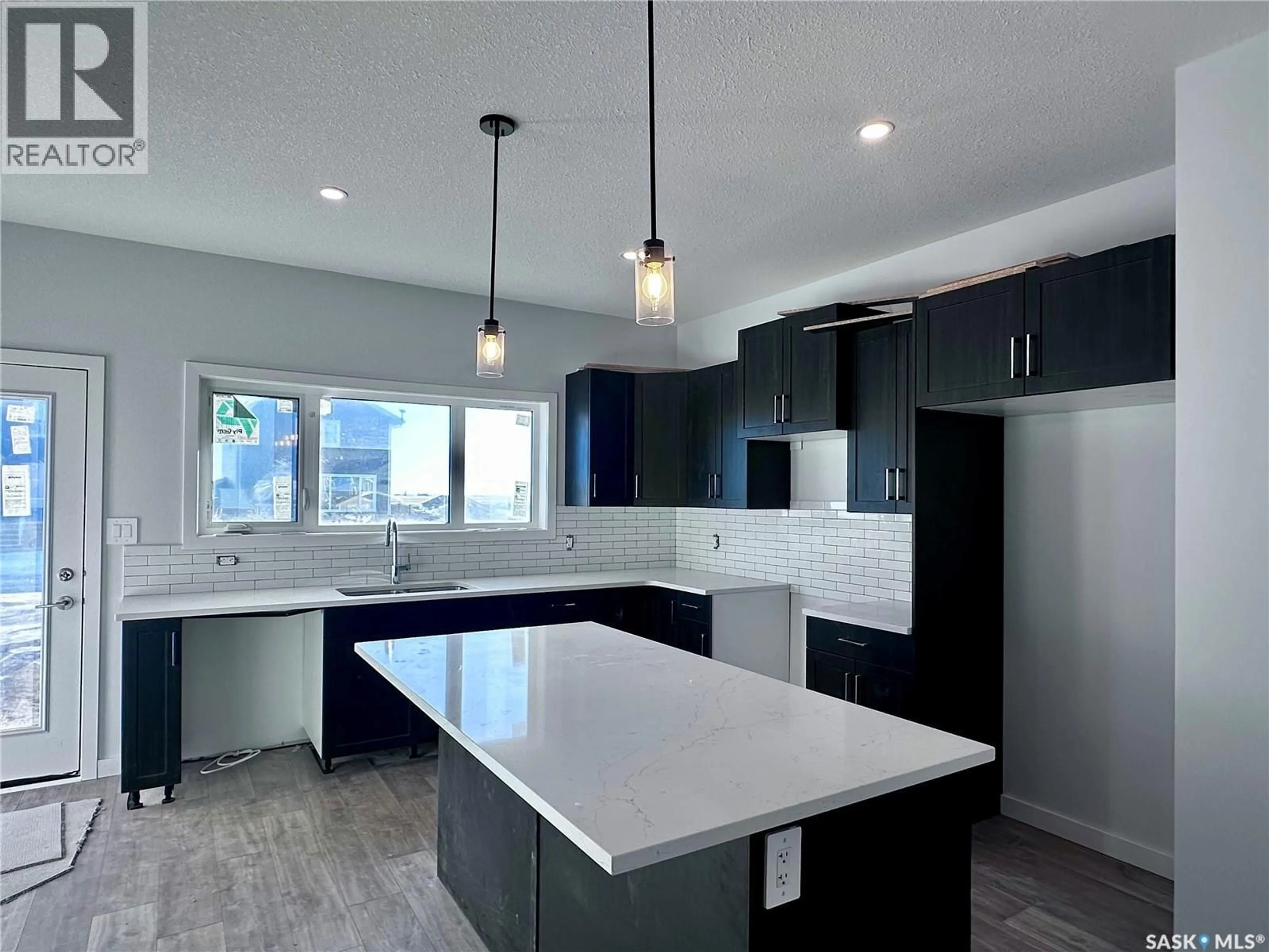 Open concept kitchen, unknown for 1123 CAMDEN GARDENS, White City Saskatchewan S4L0G1