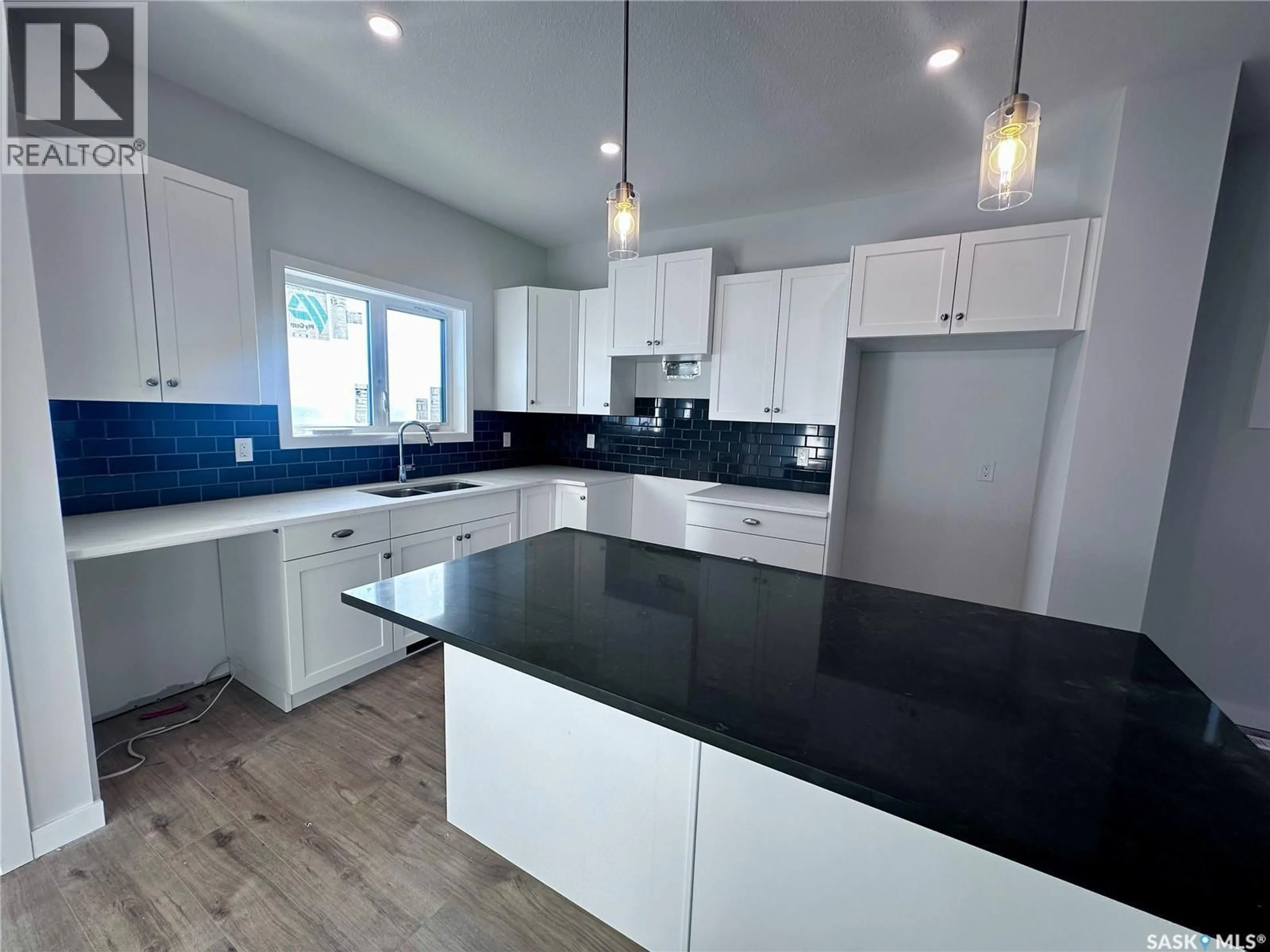 Open concept kitchen, unknown for 1121 CAMDEN GARDENS, White City Saskatchewan S4L0G1