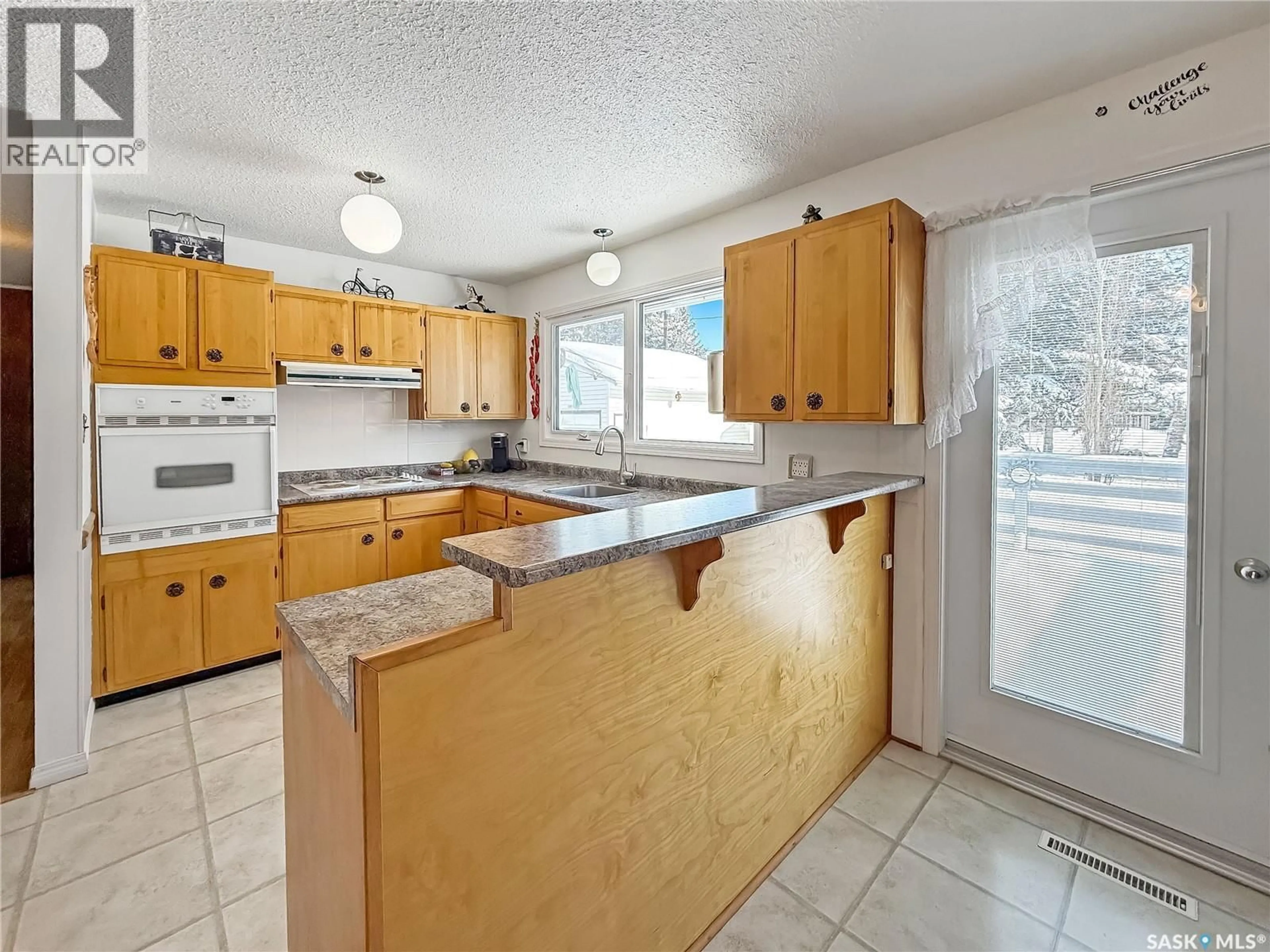Open concept kitchen, unknown for 202 2ND AVENUE, Meath Park Saskatchewan S0J1T0