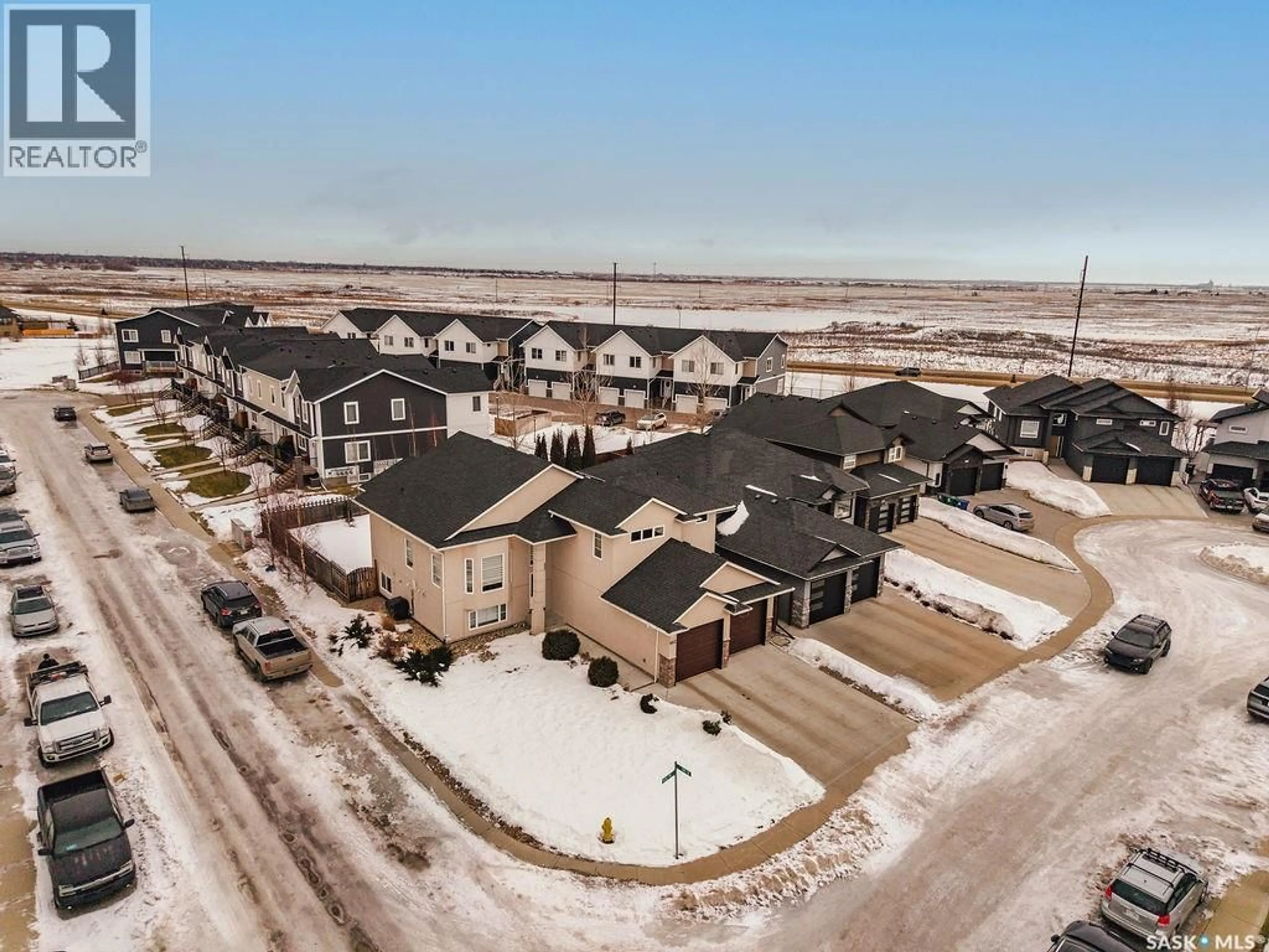 A pic from outside/outdoor area/front of a property/back of a property/a pic from drone, street for 602 KLOPPENBURG TERRACE, Saskatoon Saskatchewan S7W0P1