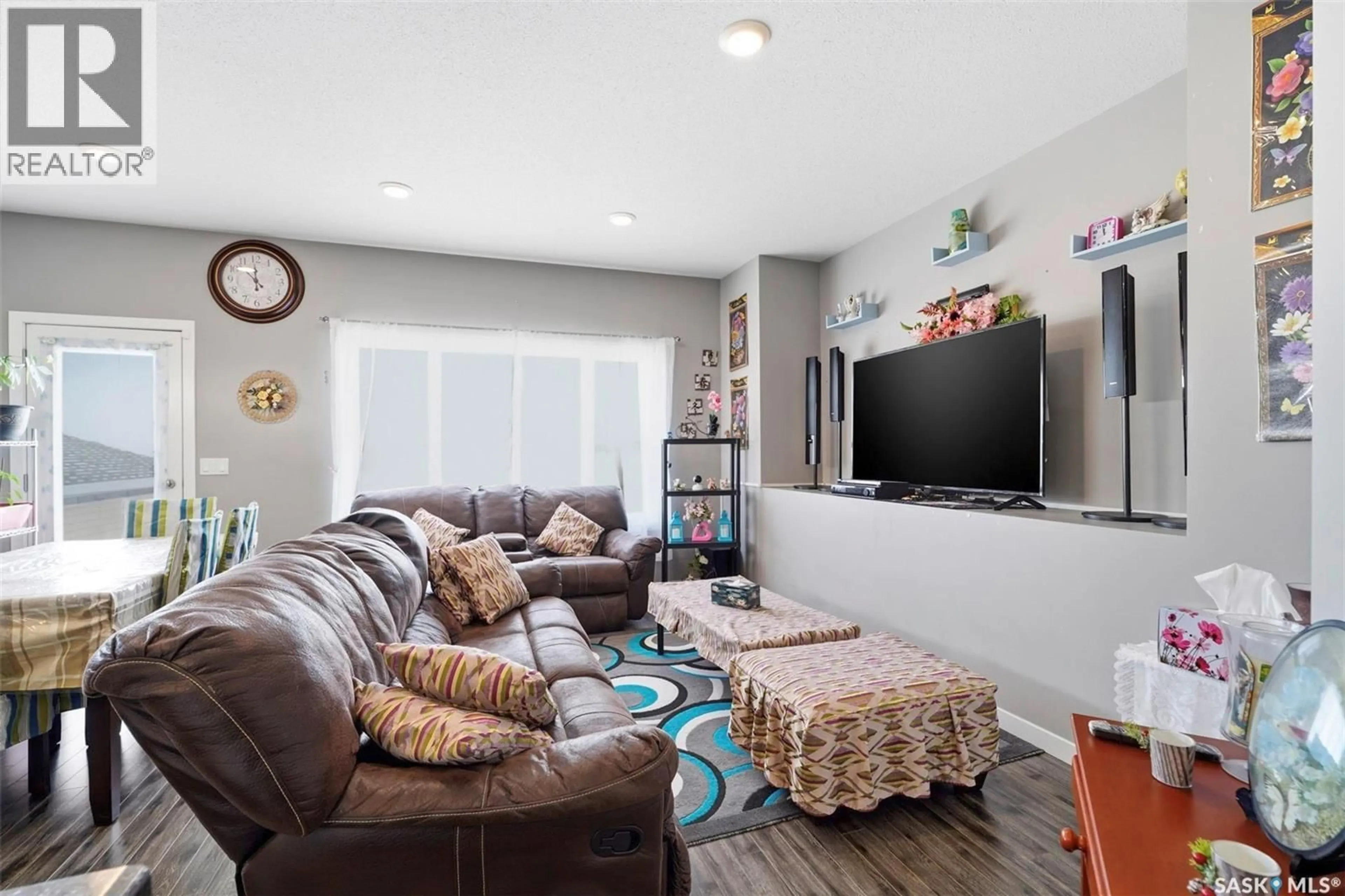 Living room with furniture, unknown for 3930 33RD STREET, Saskatoon Saskatchewan S7R0M2