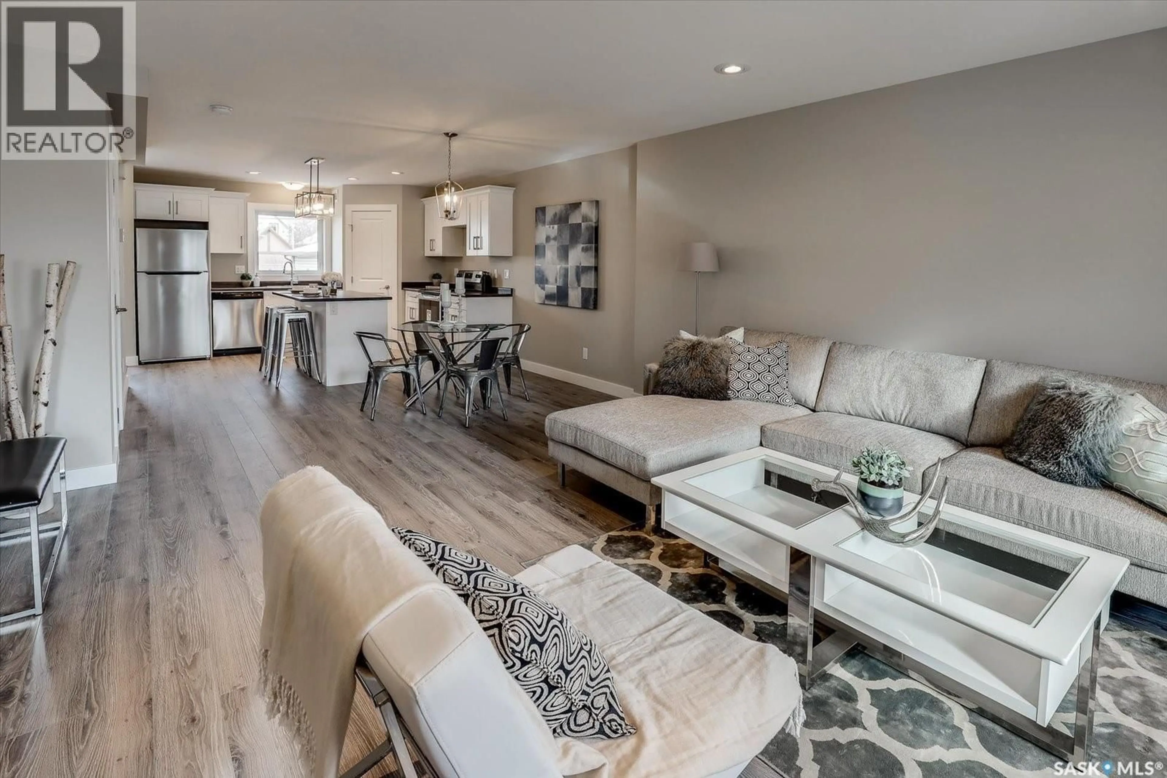 Living room with furniture, unknown for 133 E AVENUE, Saskatoon Saskatchewan S7M1R7