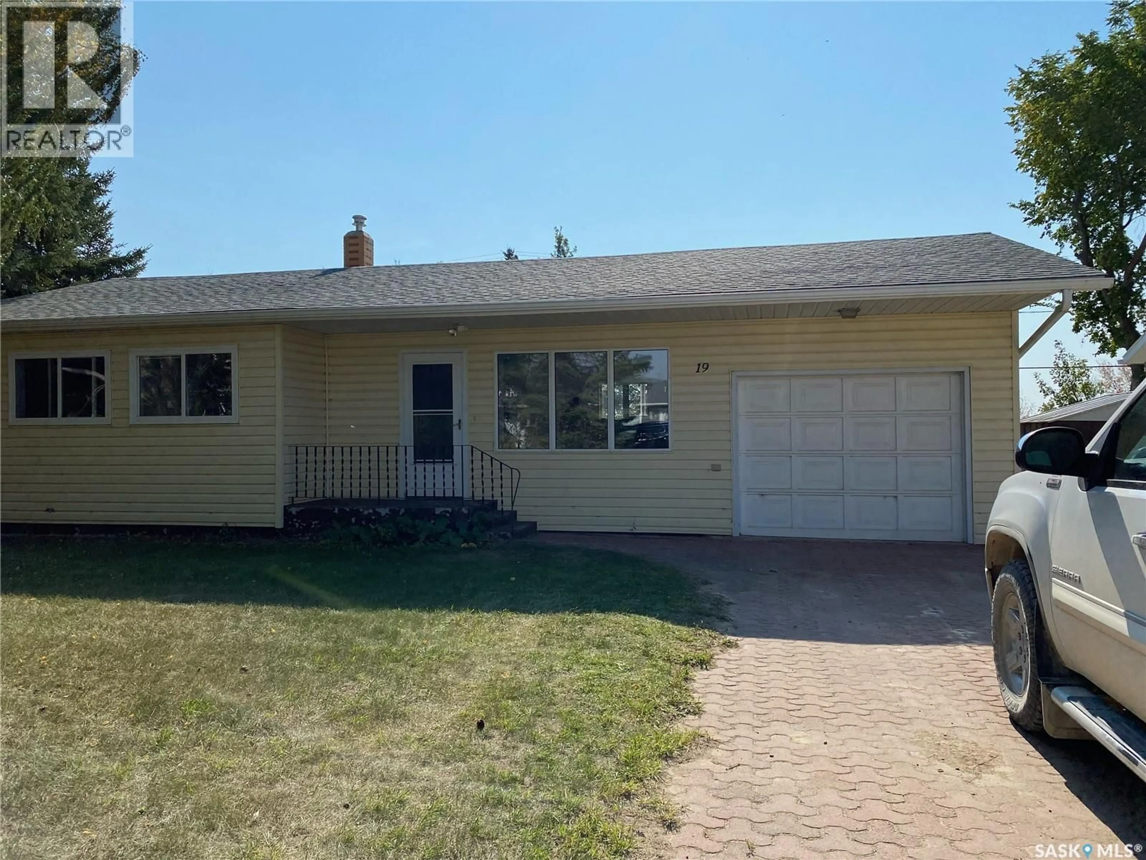 Home with vinyl exterior material, street for 19 SASKATCHEWAN AVENUE, Quill Lake Saskatchewan S0A3E0