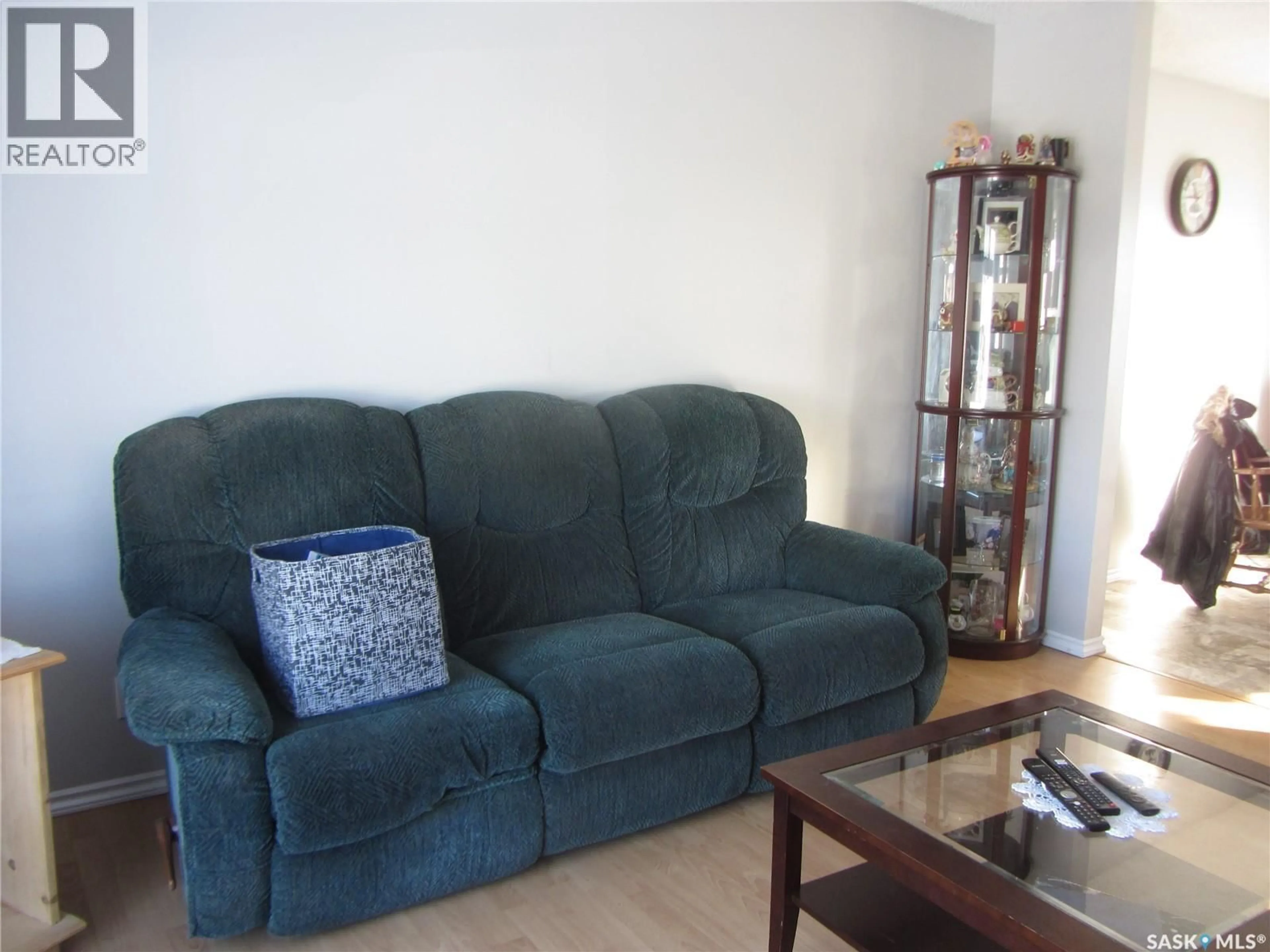 Living room with furniture, unknown for 706 KLASSEN BAY, Martensville Saskatchewan S0K2T2