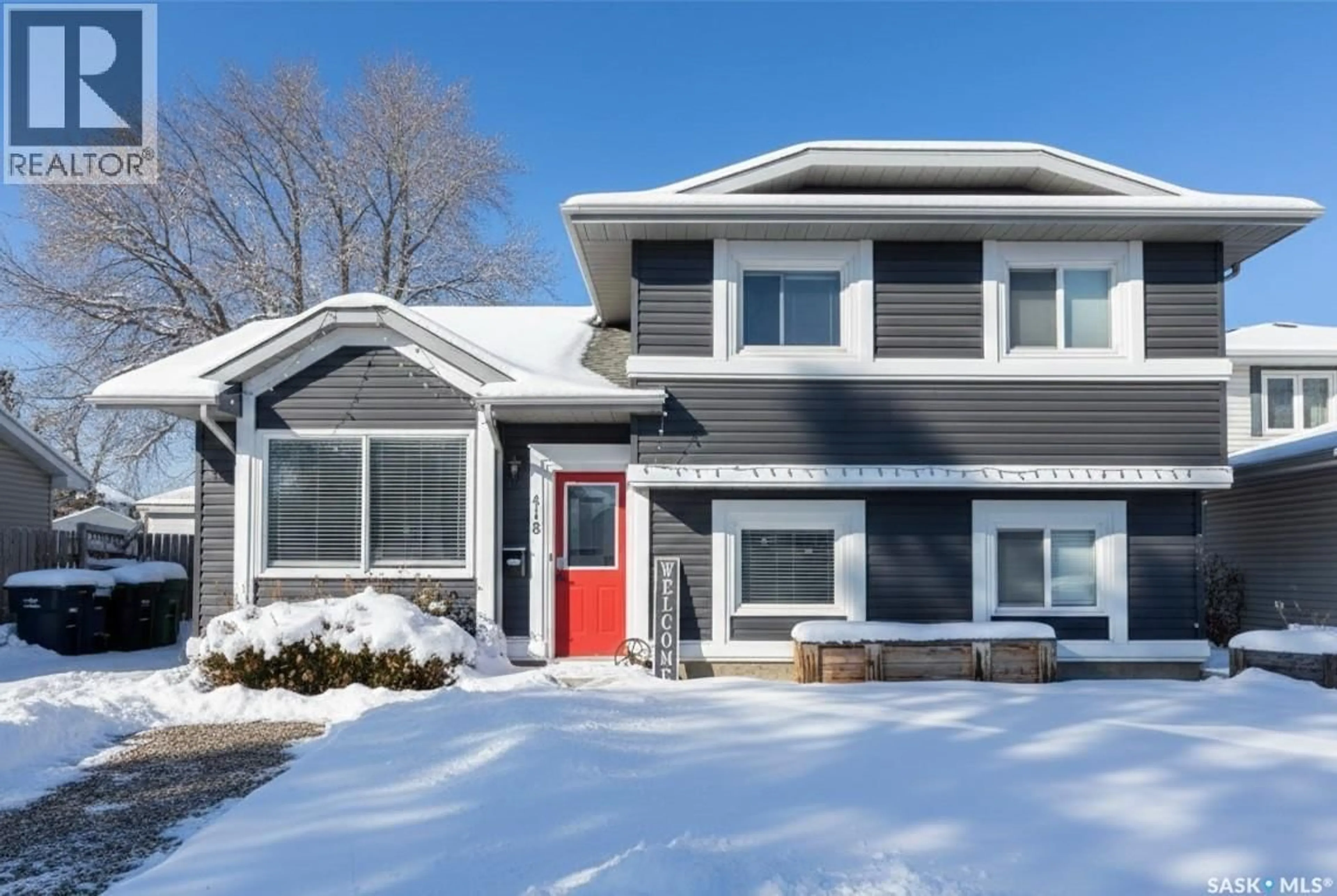 Home with vinyl exterior material, street for 418 KENDERDINE ROAD, Saskatoon Saskatchewan S7N3S1